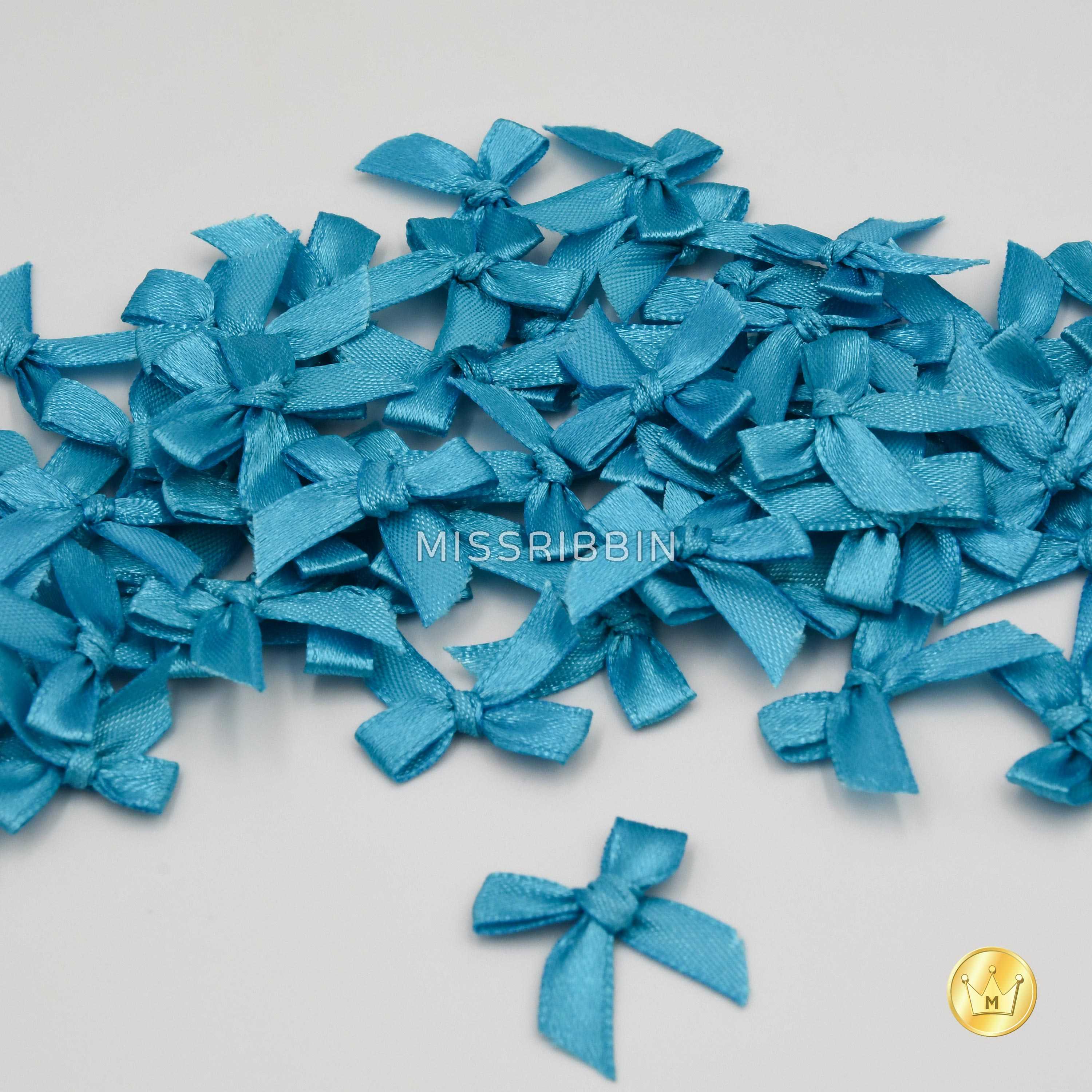 โบว์จิ๋วแบบผูก ขนาด 7/13มม (สี606) แพ็ค 100ชิ้น