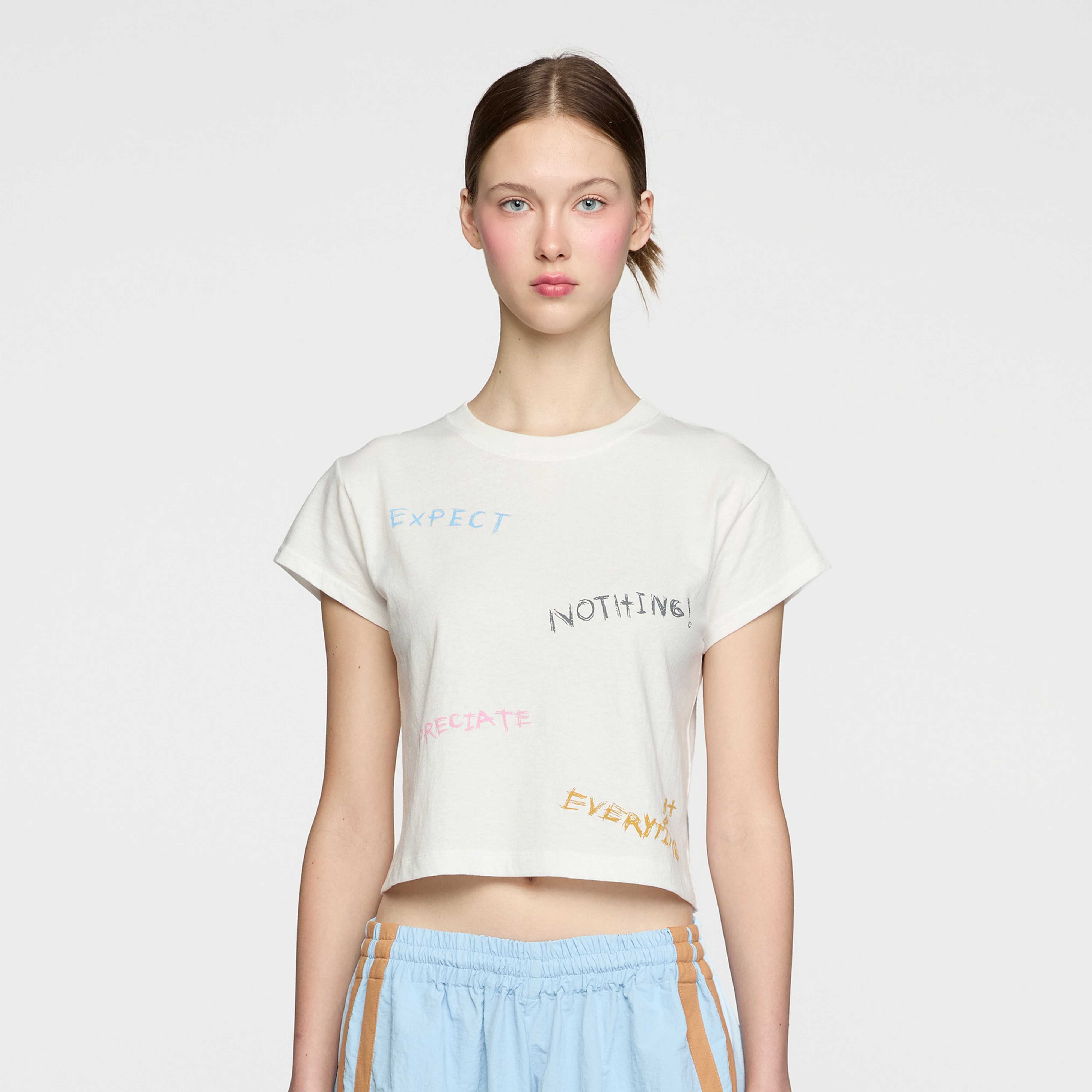 EXPECT NOTHING BABY TEE