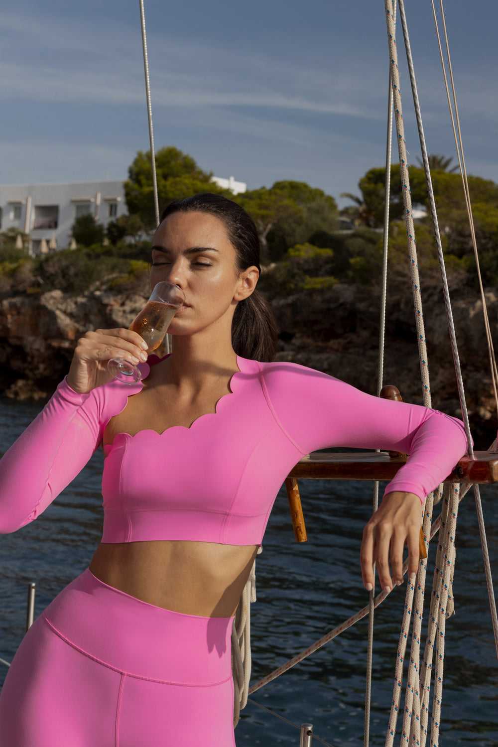 WISKII ASYMMETRICAL LONG SLEEVE CROP TOP - PINK HOLLYWOOD