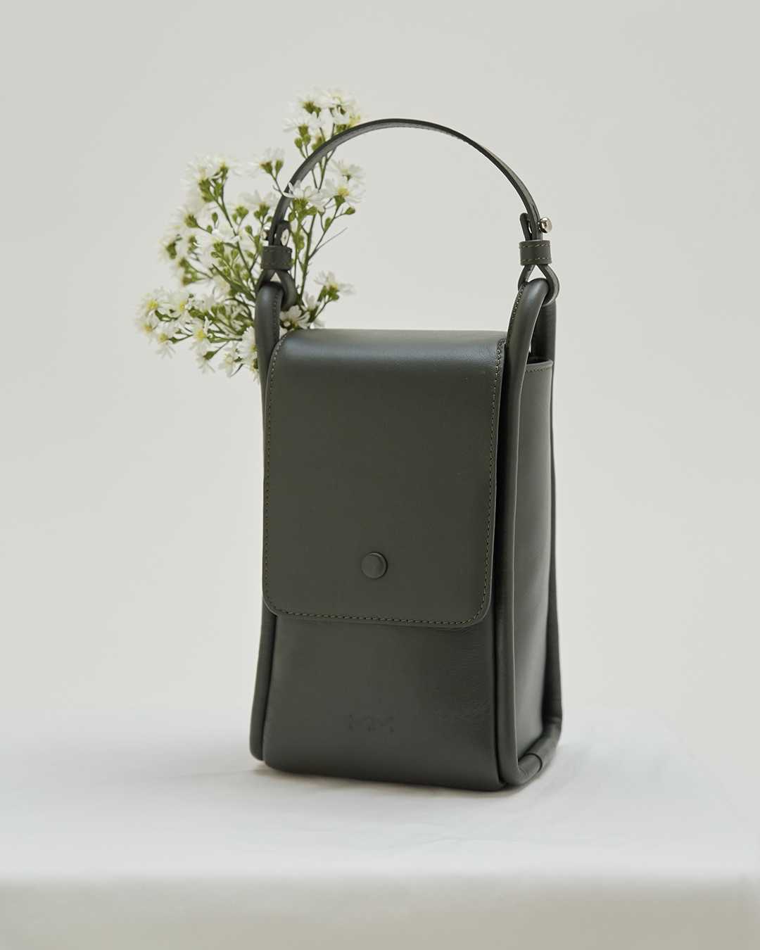 emily. - compact crossbody in basil green