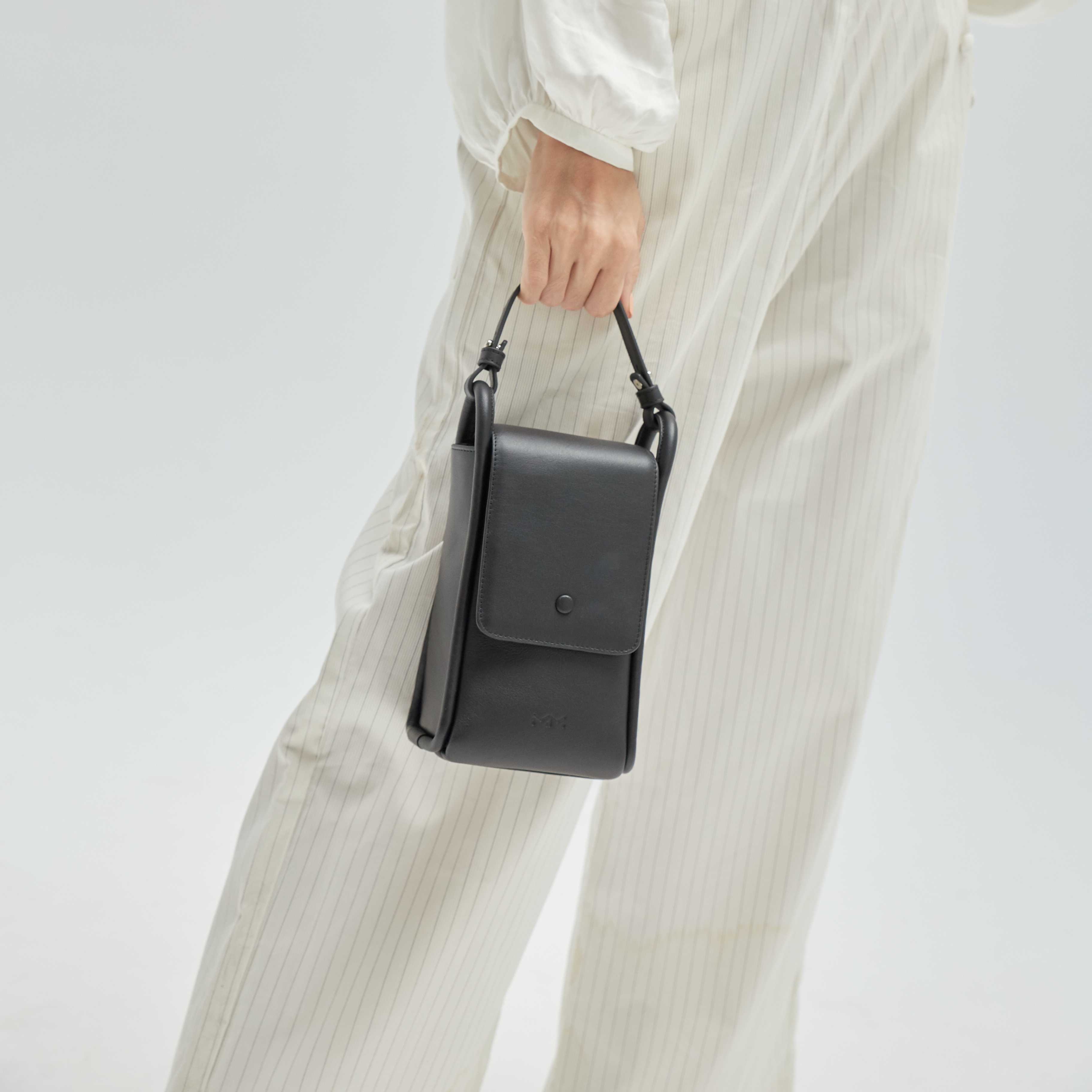 emily. - compact crossbody in black