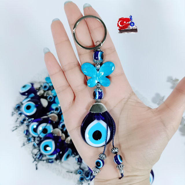 Evil Eye  พวงกุญแจจากตุรกี แก้ว 3CM + เรซิ่นรูปผีเสื้อ ปกป้องจากสิ่งชั่วร้ายพลังงานลบ นำพาความโชคดี