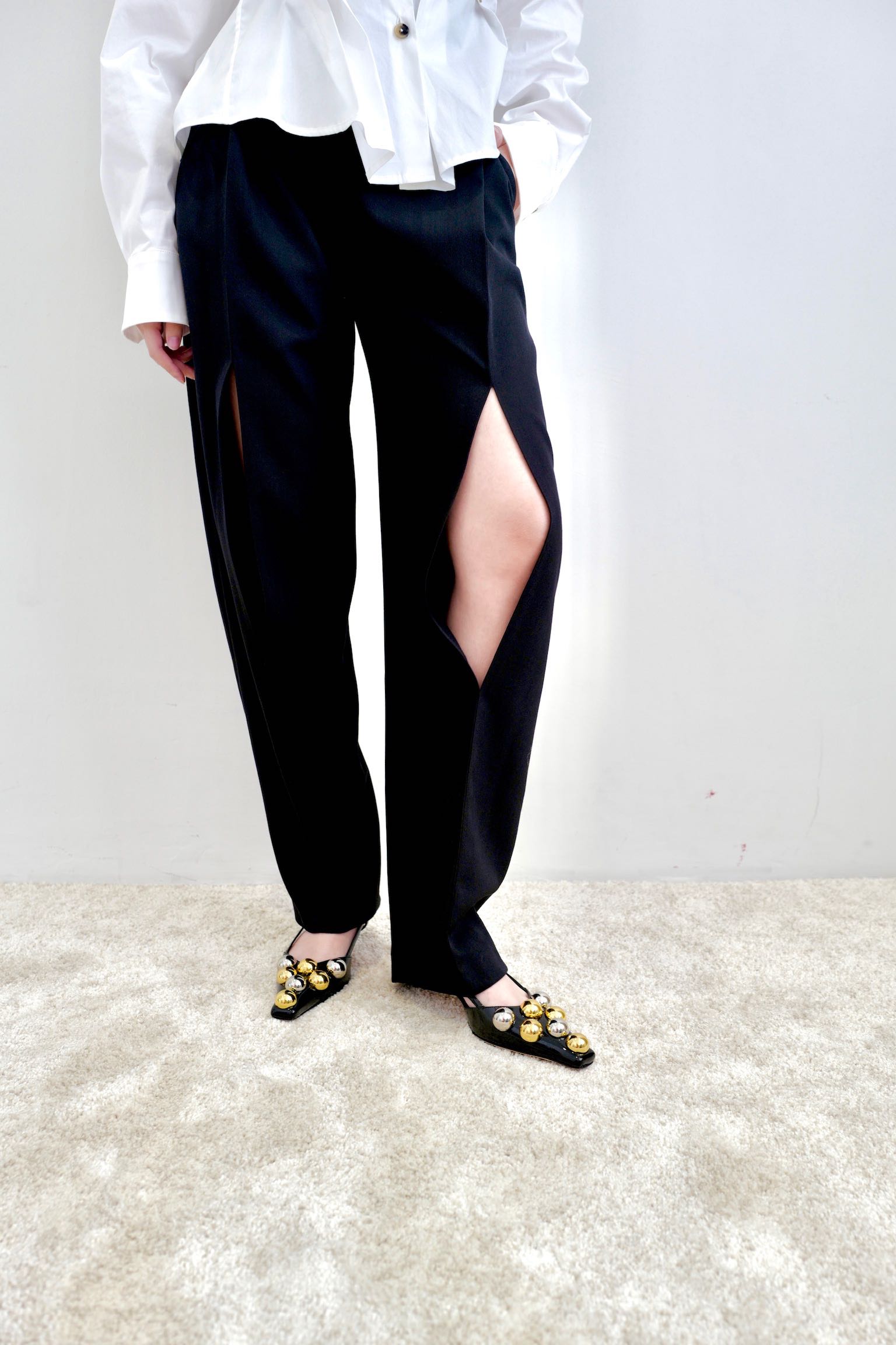 A.W.A.K.E. MODE TAPERED PANTS WITH VERTICAL SLIT KNEES - BLACK
