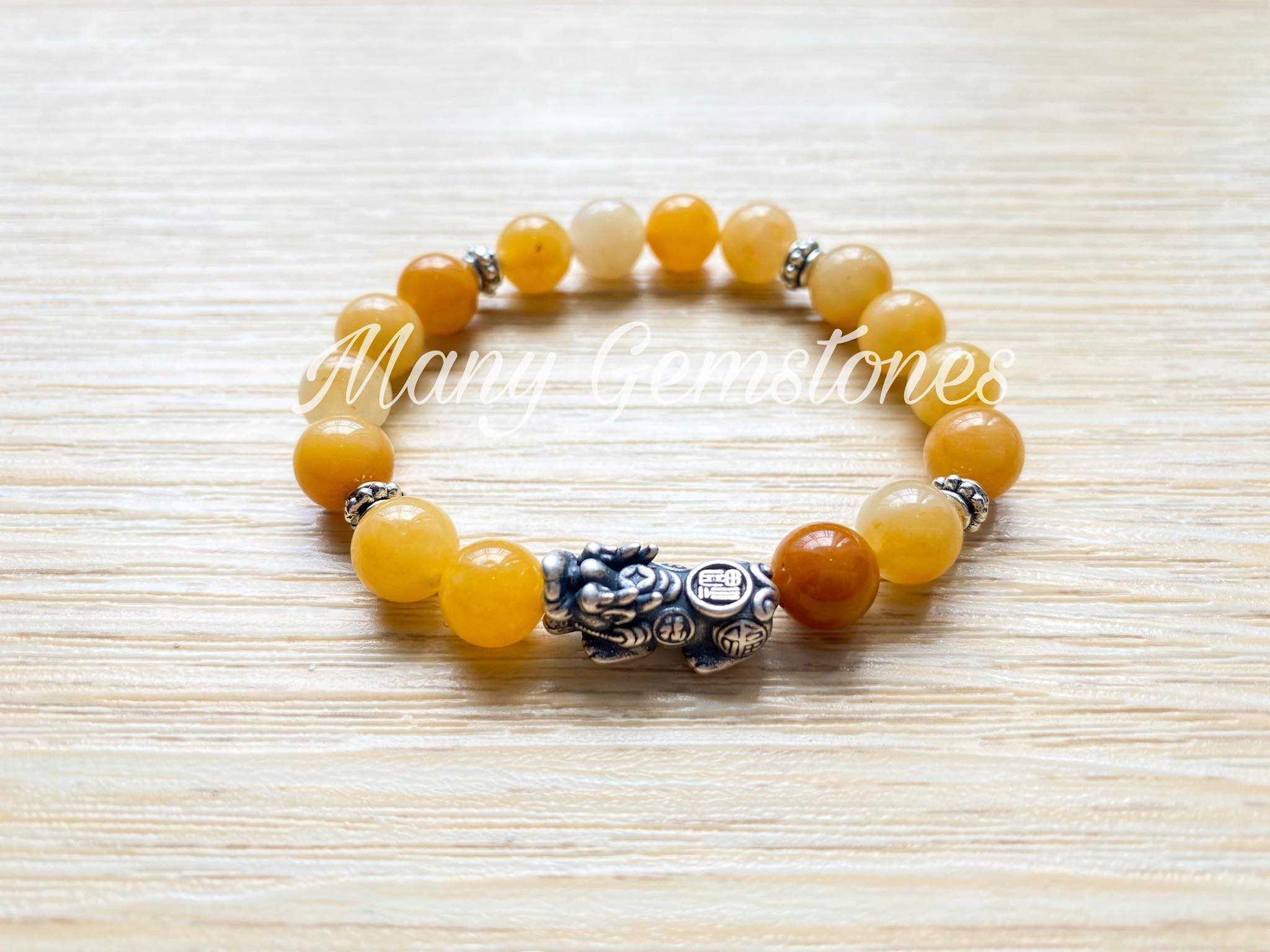 กำไลหินมงคล  สร้อยข้อมือหินมงคล ปี่เซียเงินแท้ Honey Jade