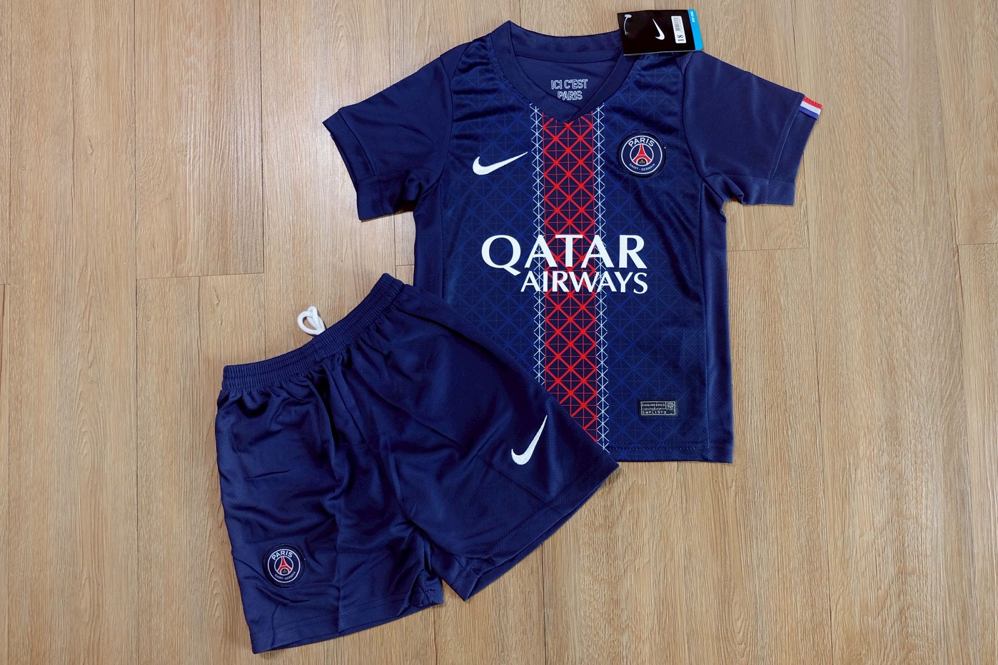 ชุดฟุตบอลเด็กเปเอซเซ เหย้า สีกรม Fans Edition เกรดเเฟนบอล 2026