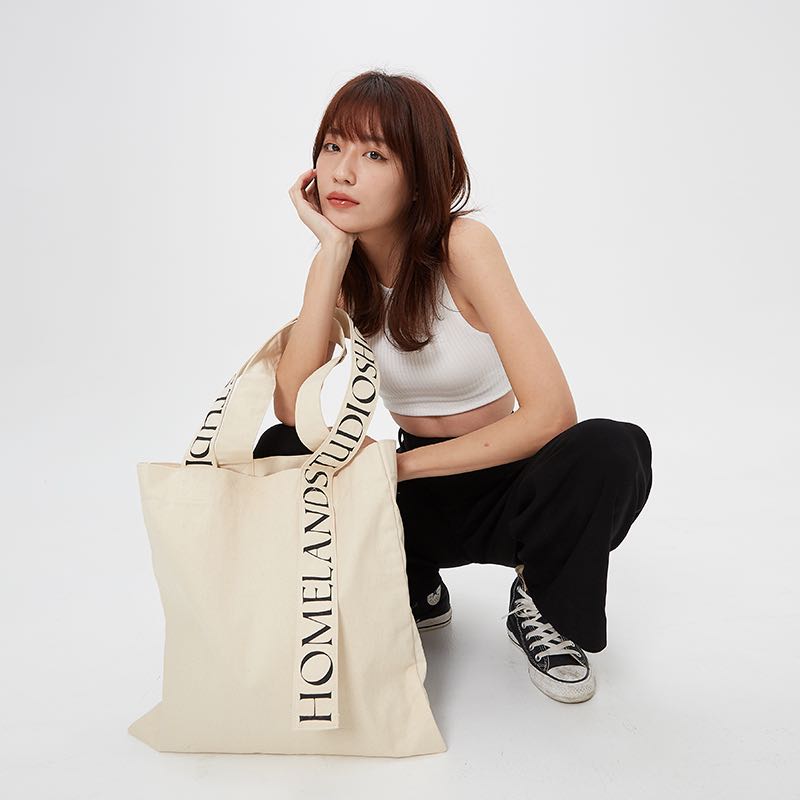 HOMELAND - กระเป๋าผ้า canvas รุ่นสกรีนสาย (tote bag) สีครีม