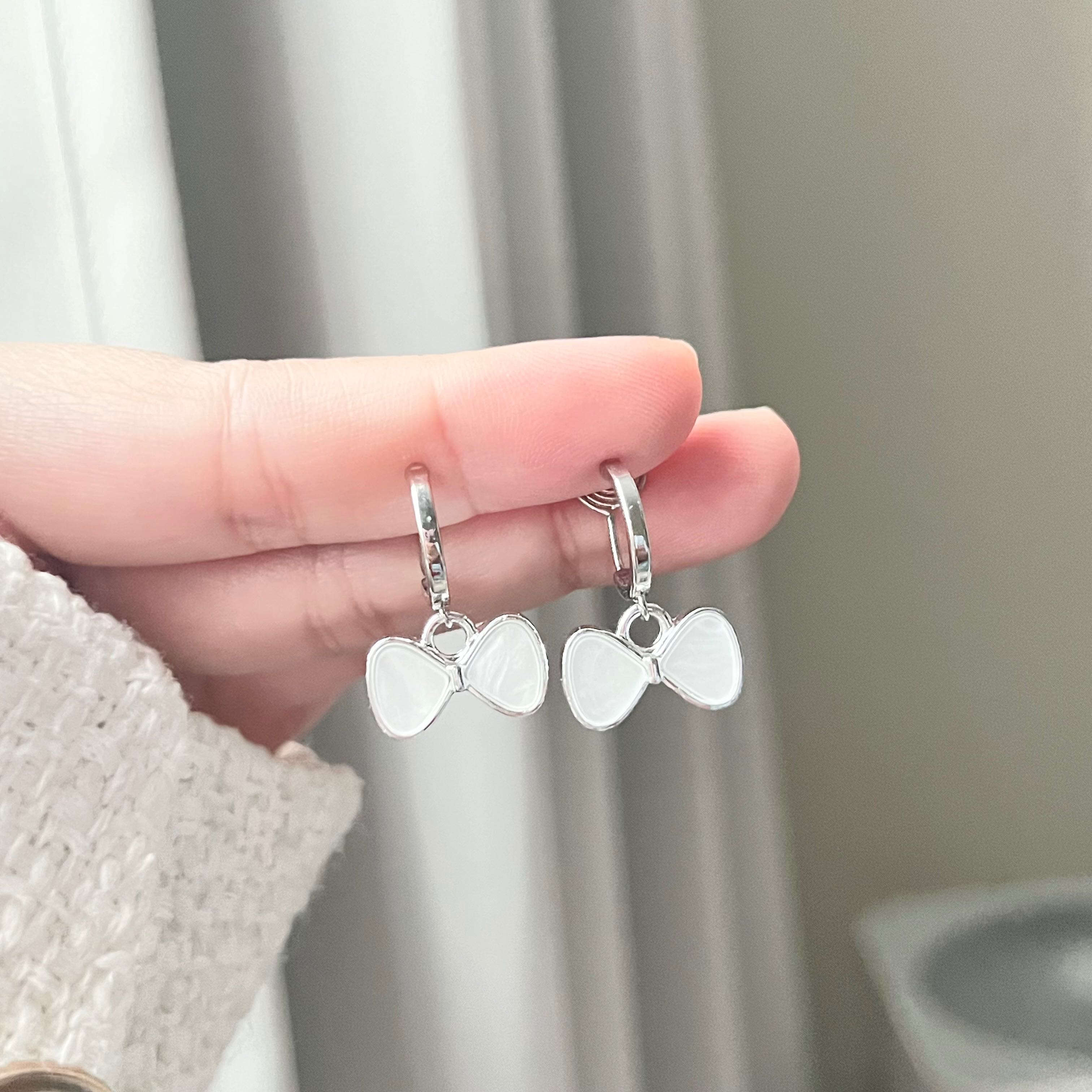 MQ ห่วงเงินจี้โบว์ขาว แป้นขดลวด