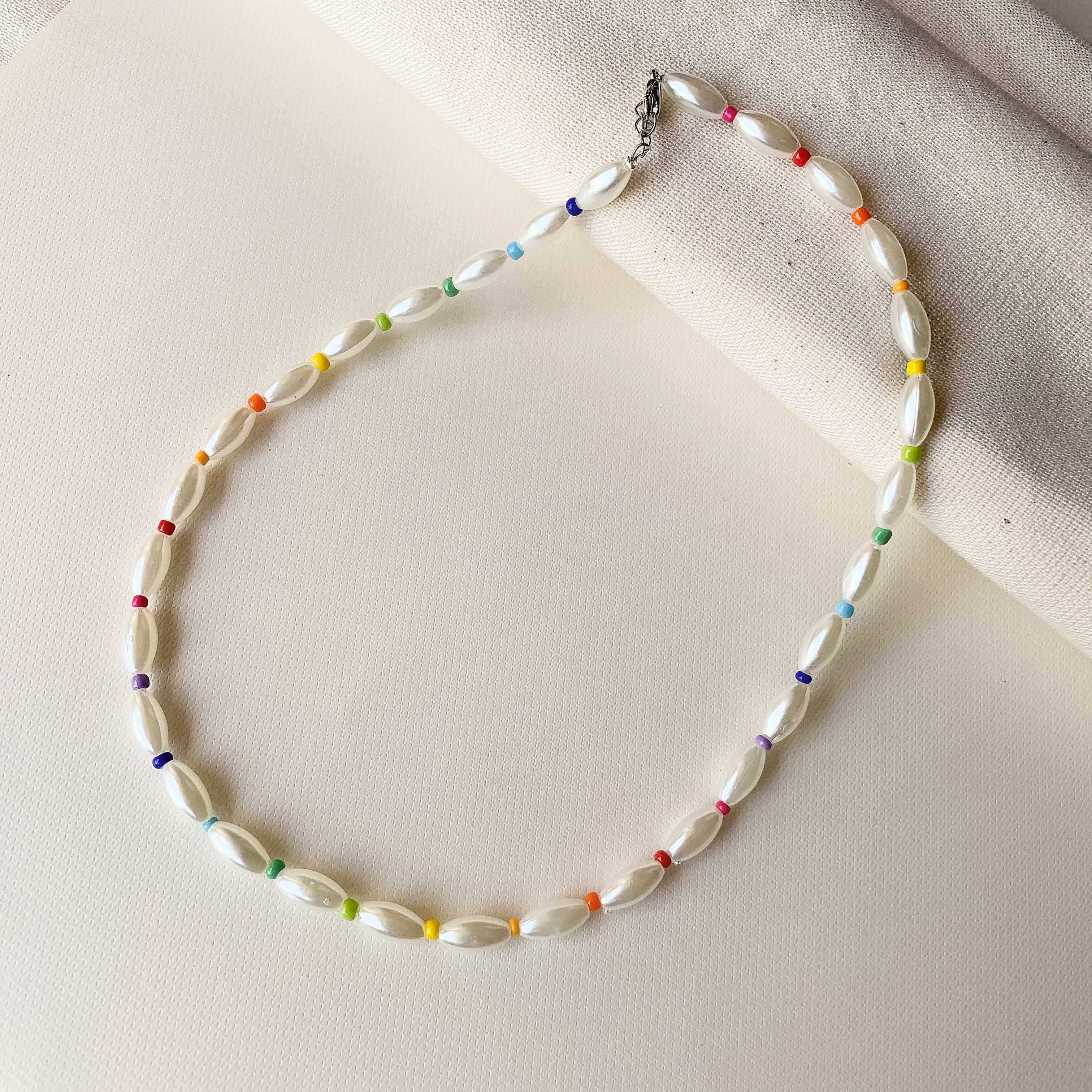 rainbow x necklace
