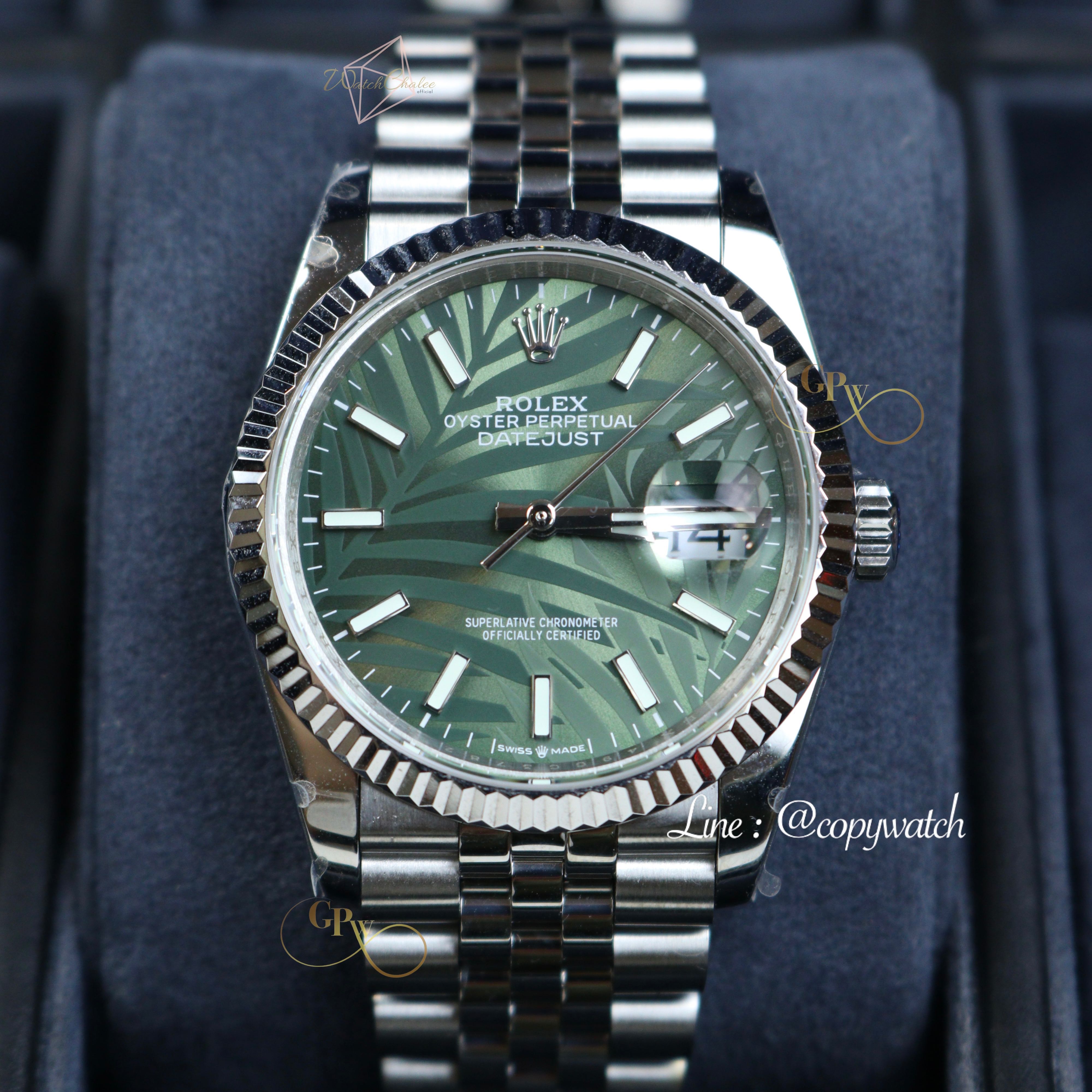 Rolex Datejust  Steel 36 mm. Green palm Automatic swiss movement Unisex