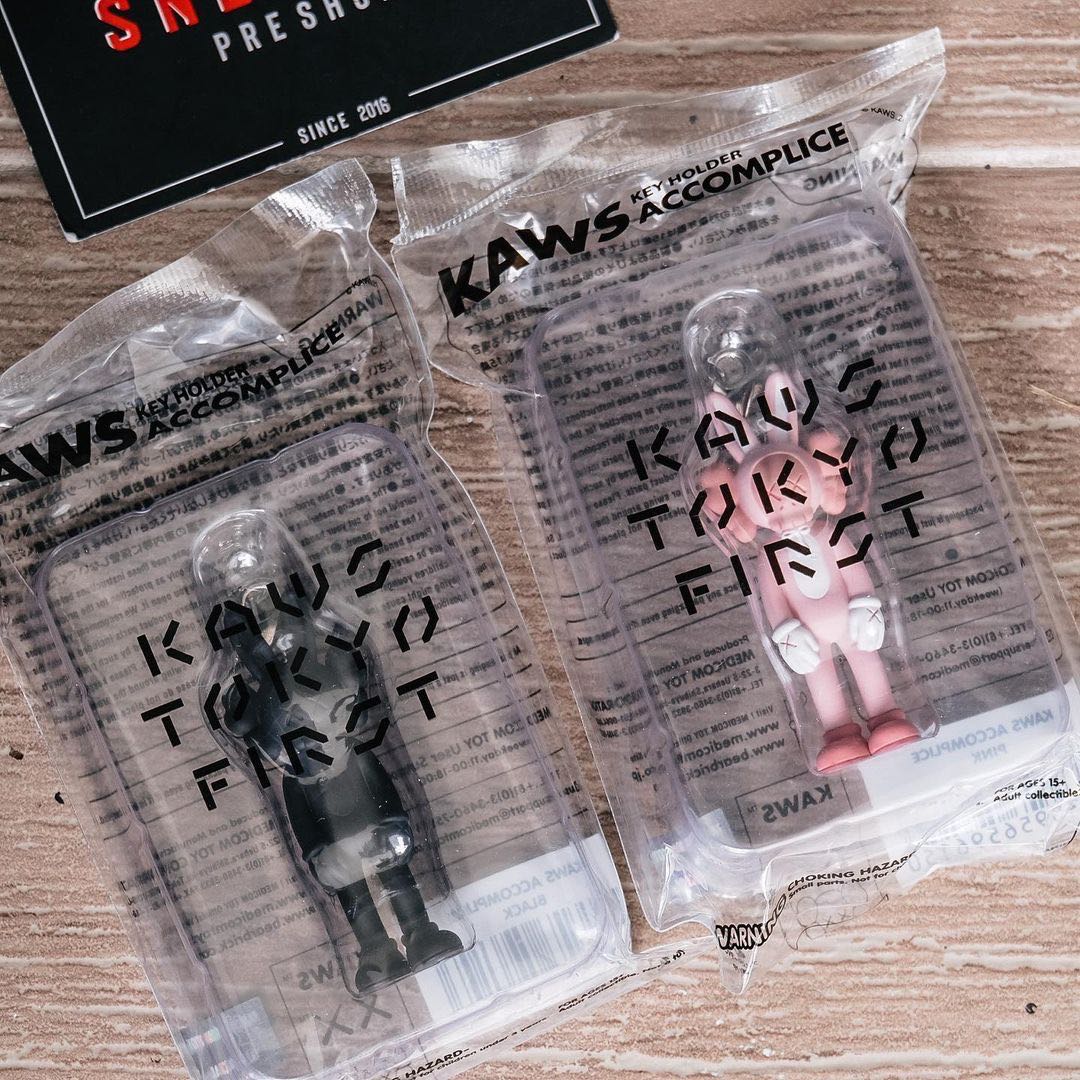 KAWS “Tokyo First” Accomplice Pink/Black Keychain Set 