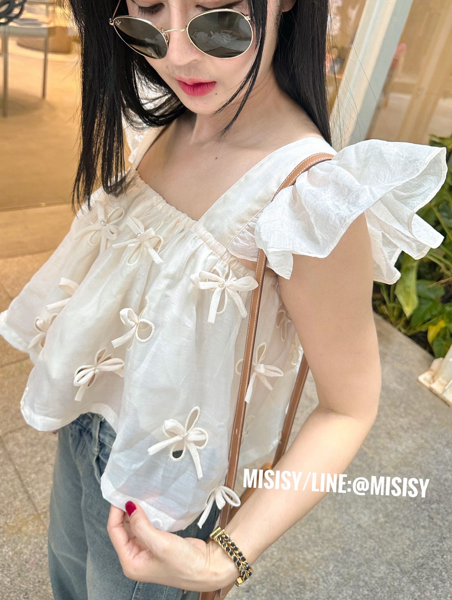 เสื้อแขนระบายแต่งโบว์