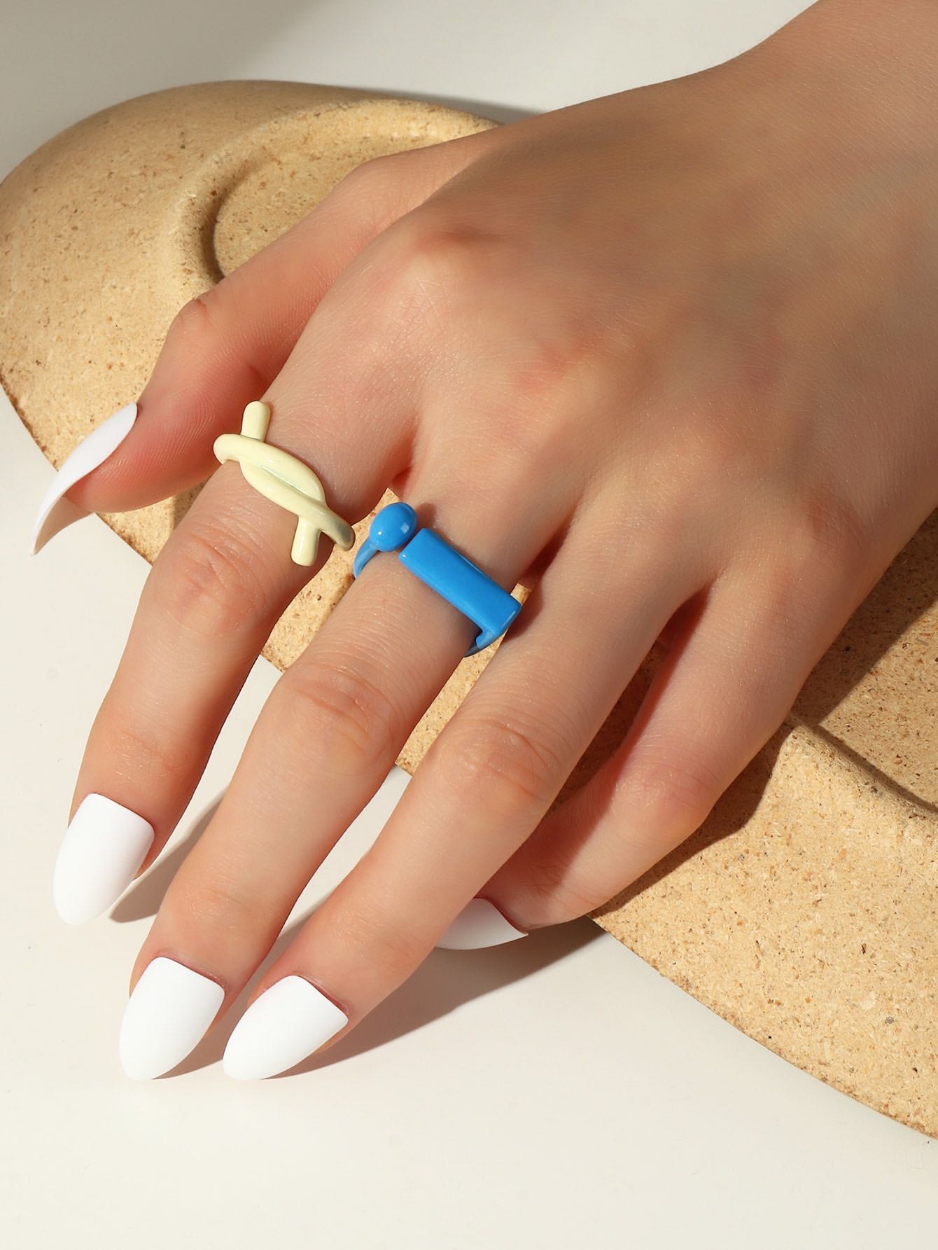 Blue and cream structure resin rings