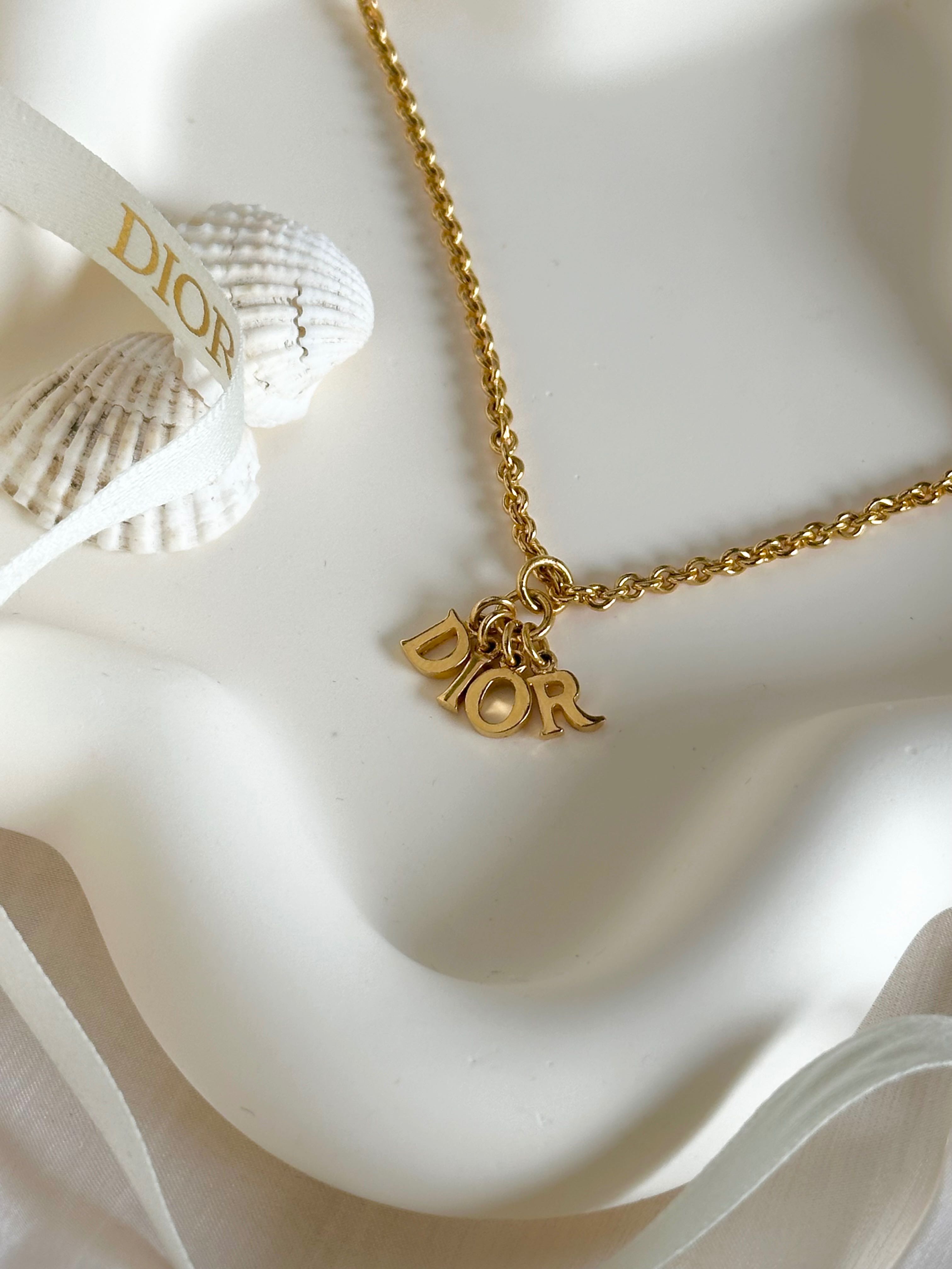 Dior mini spell out necklace 🍒