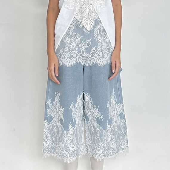 Rotsaniyom Light blue wide leg midi jeans with lace detail
