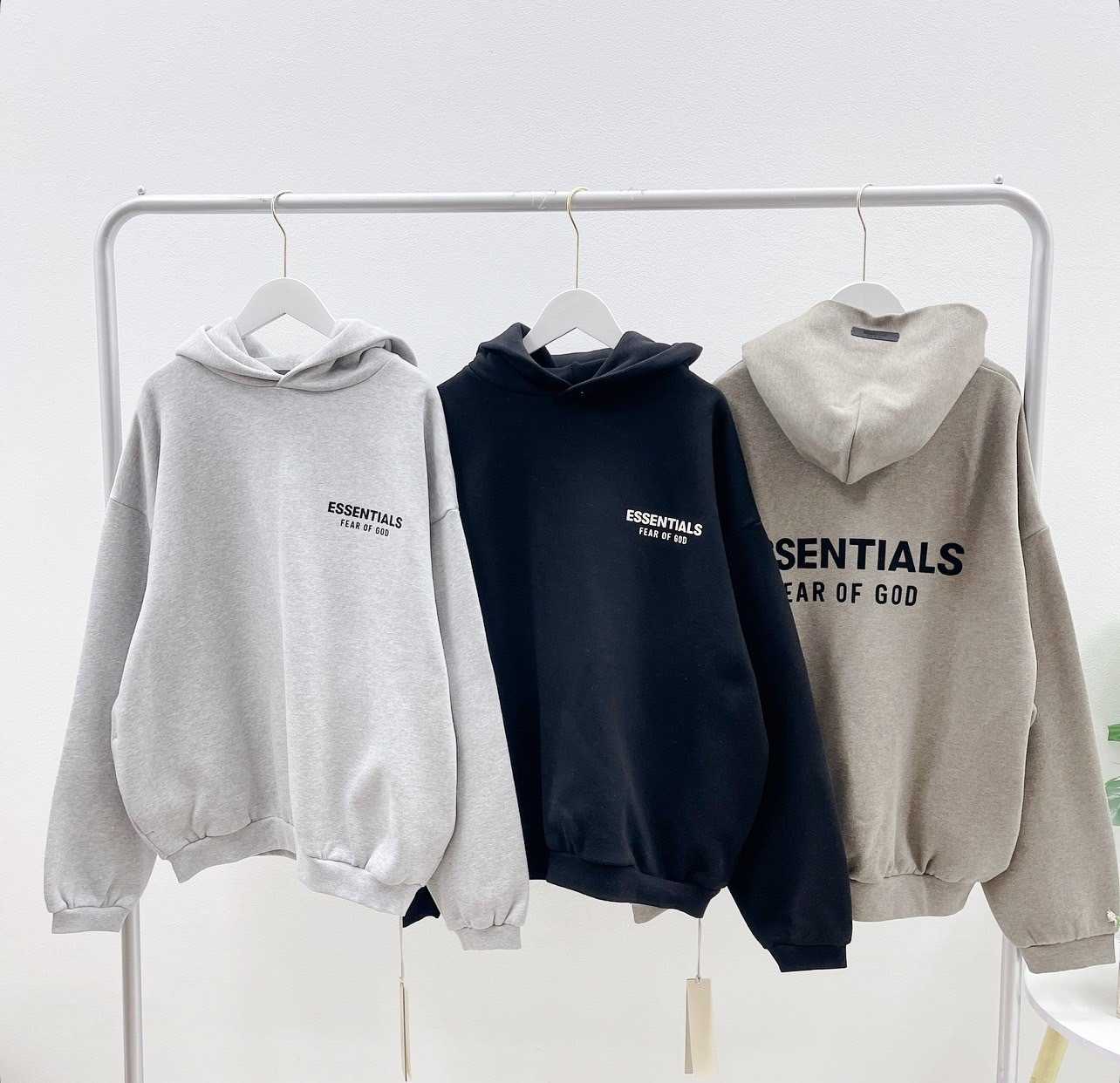 Essentials Fleece Hoodie (Light Hearther)