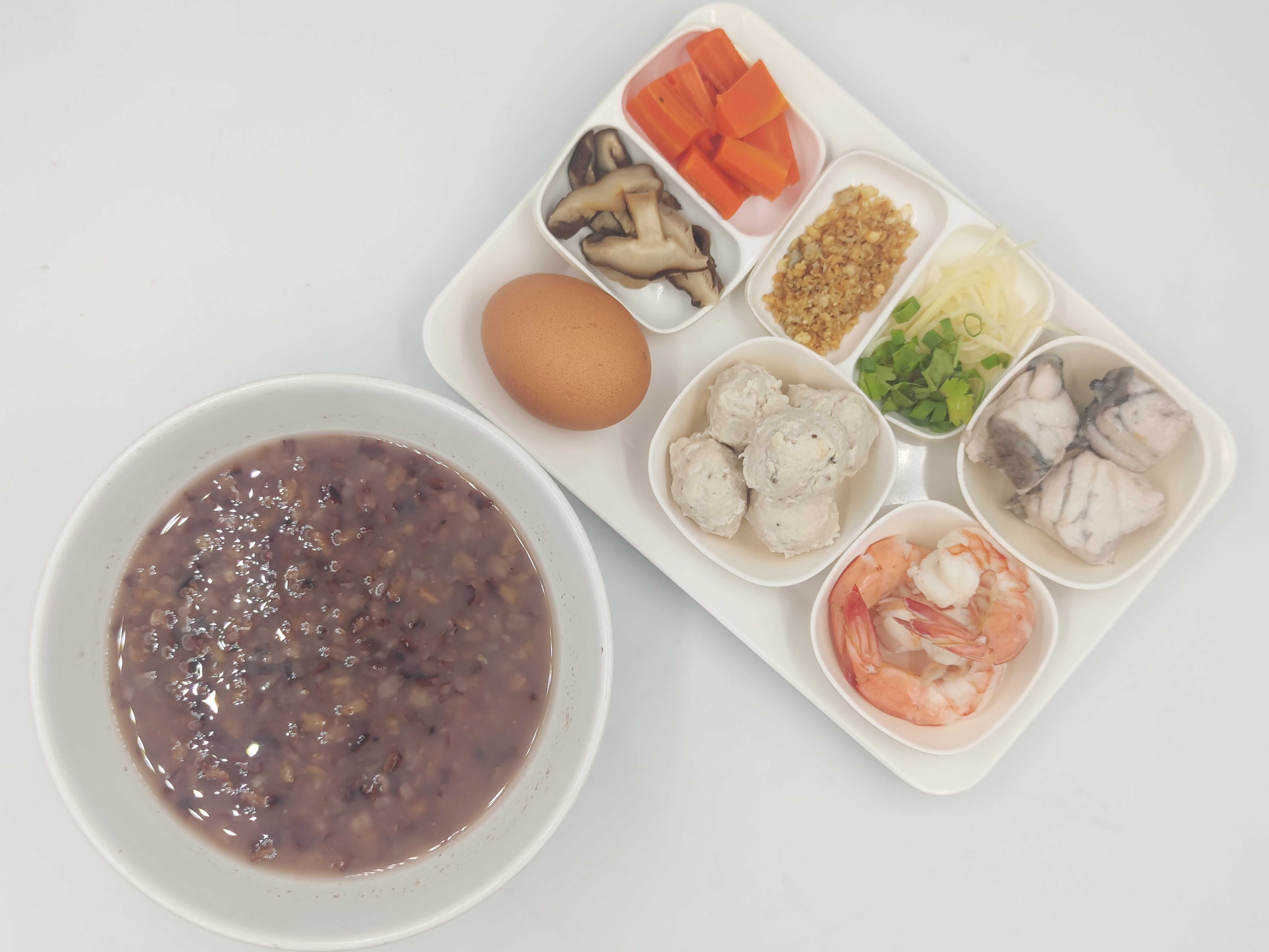 ข้าวต้มไรซ์เบอรี่ปลากะพง/กุ้ง (ลูกค้าระบุเนื้อสัตว์มาในข้อความ)