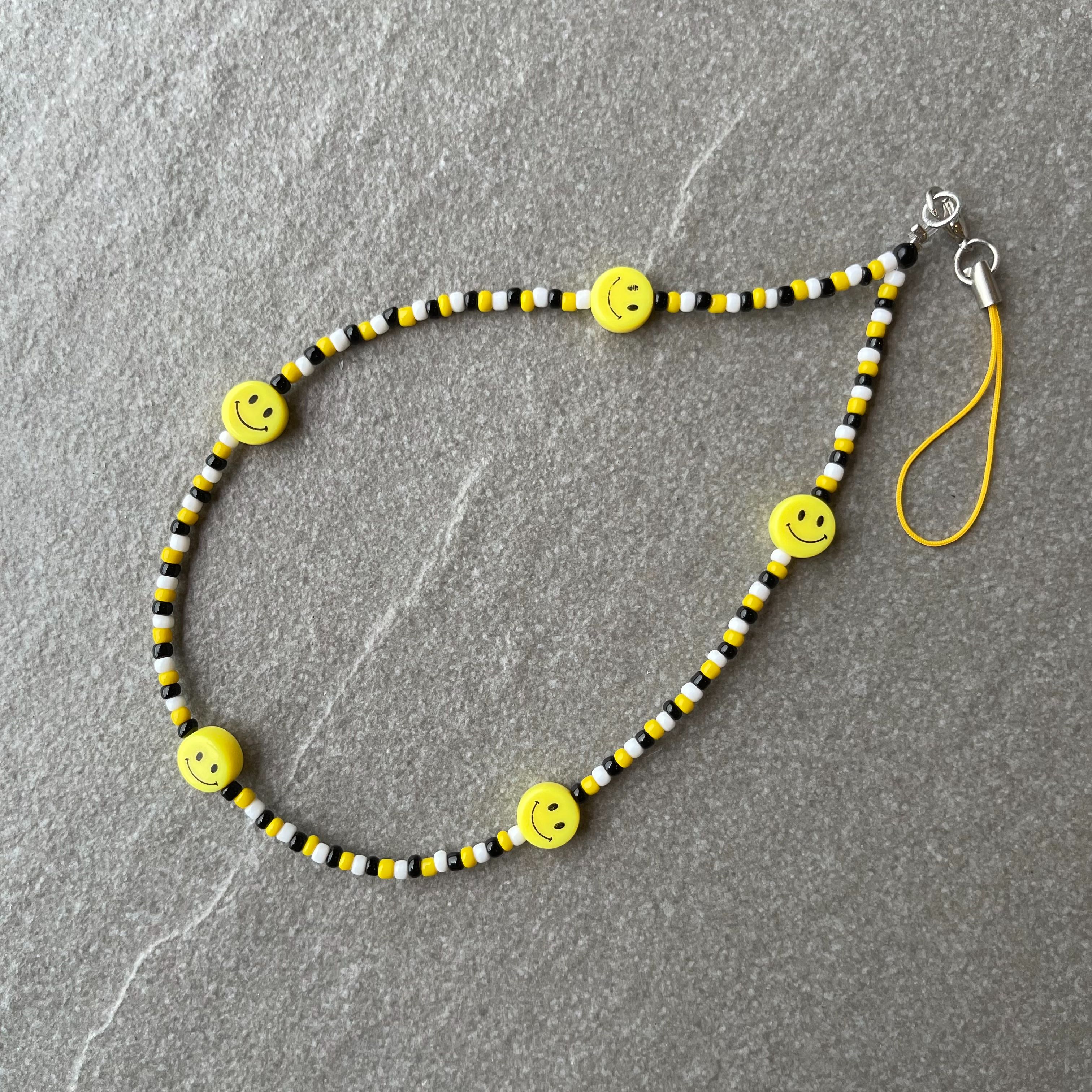 ☻︎ พร้อมส่ง ☻︎ (Ready to ship!) Yellow&Black Smiley Phone Strap