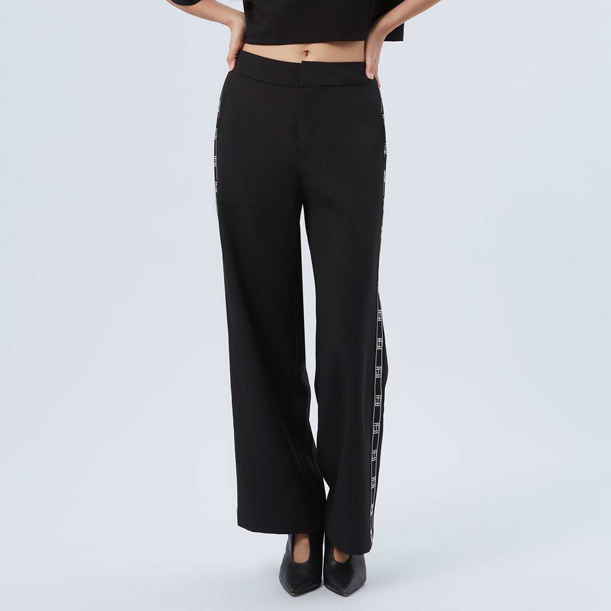 กางเกงทรงแฟลร์แต่งแถบริบบิ้น | FF Logo Ribbon Trim Flair Leg Trousers | 06381