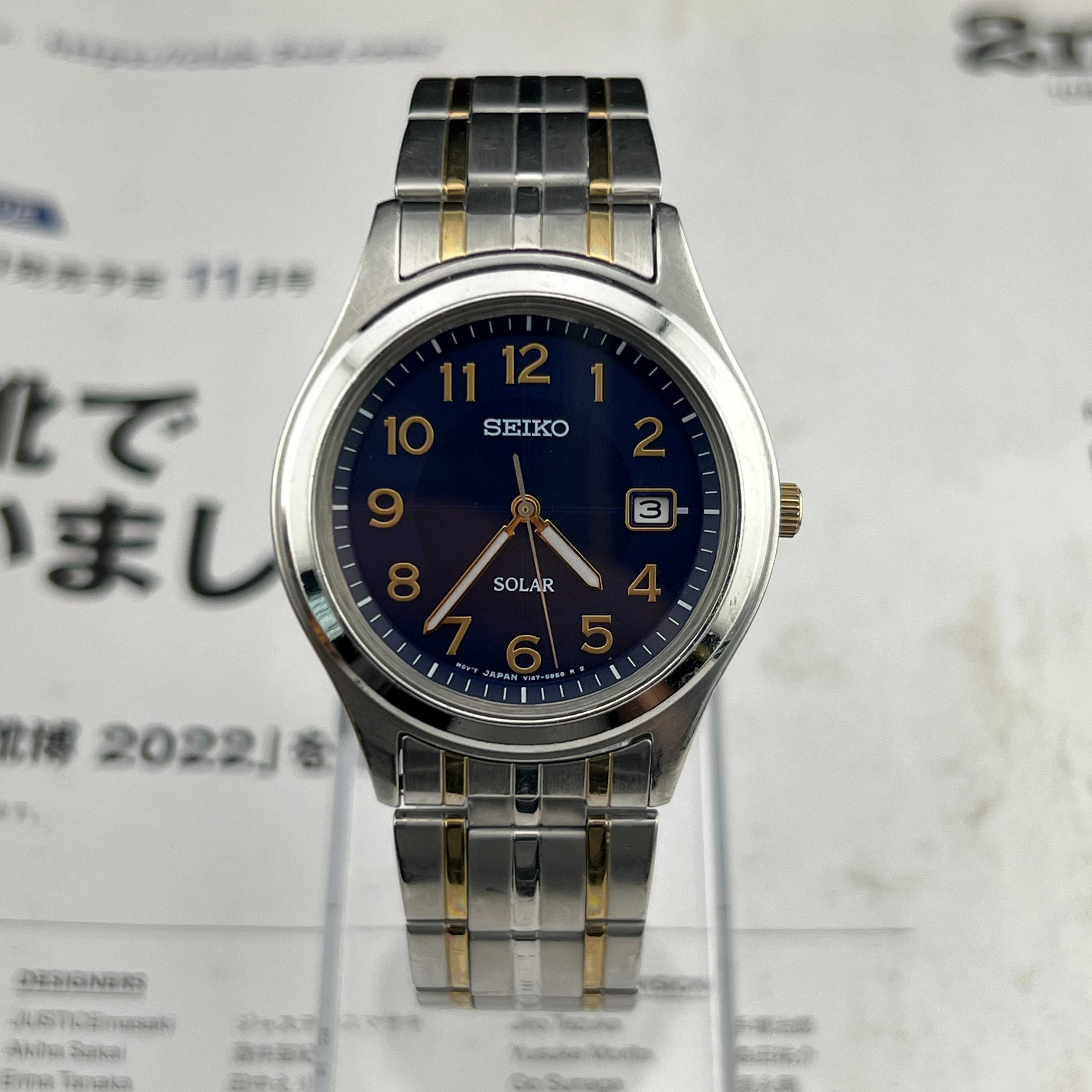 Vintage Seiko Solar Arabic Quartz Navy Dial Ref.V147-0AE0 Date Japan 2005