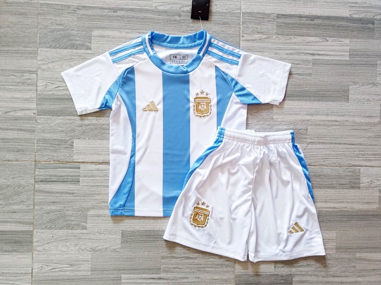 ชุดเด็กอาเจน สีฟ้า เกรดแฟนบอล 2024