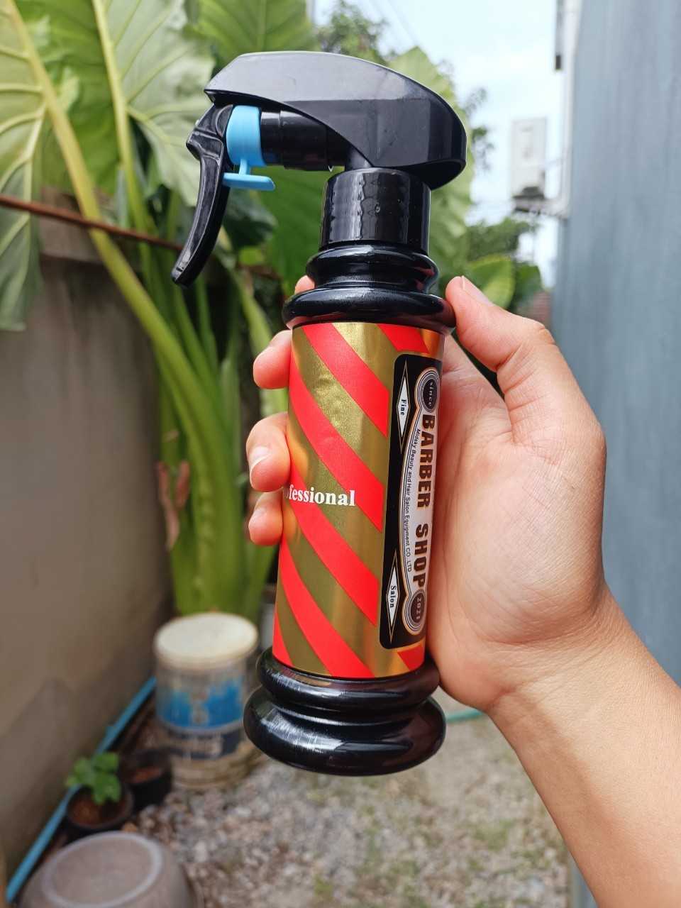 กระบอกฉีดน้ำ ลาย barber pole 180ml สีส้มดำ