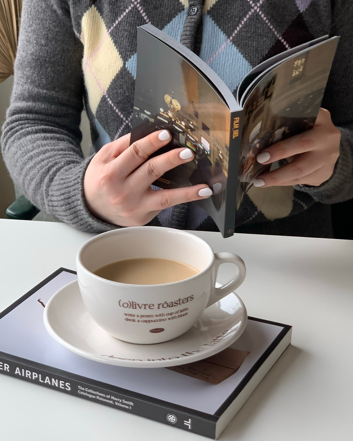 deep into the latte (cup and saucer)