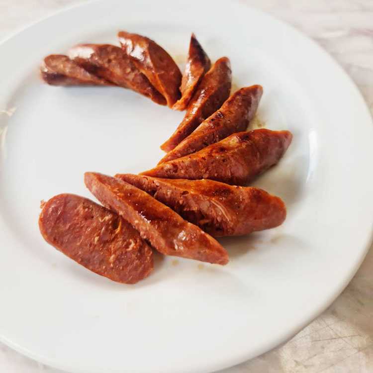 Add Merguez Sausage 1 pcs.