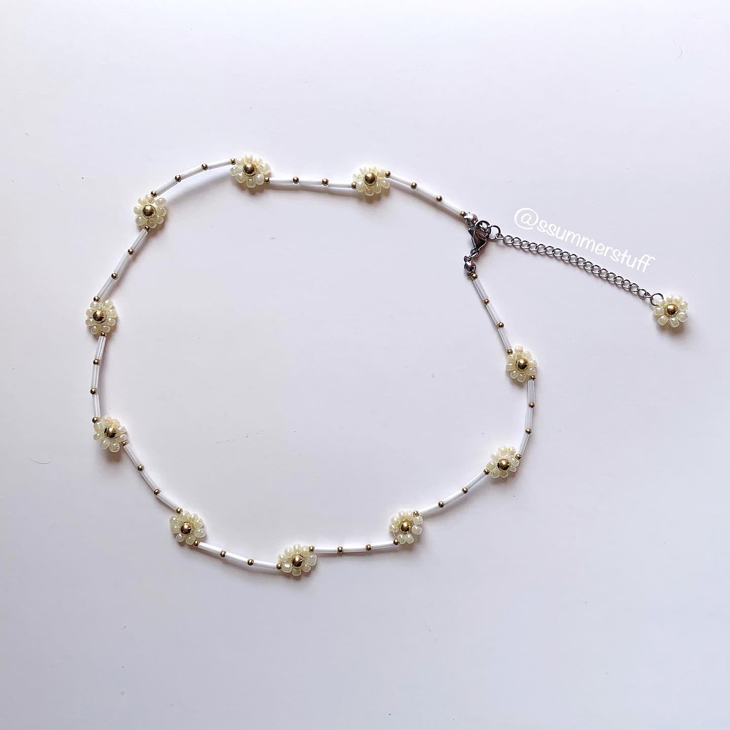 Glowing flowers necklace🌼🧡