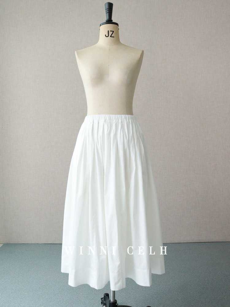 new elegant texture silky white skirt