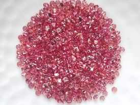 1.8mm. บุษราคัมแดงกลมเจียรเหลี่ยม กะรัตละ 180 บาท