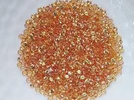 1.8mm. บุษราคัมเหลืองทองกลมเจียรเหลี่ยม กะรัตละ 180 บาท