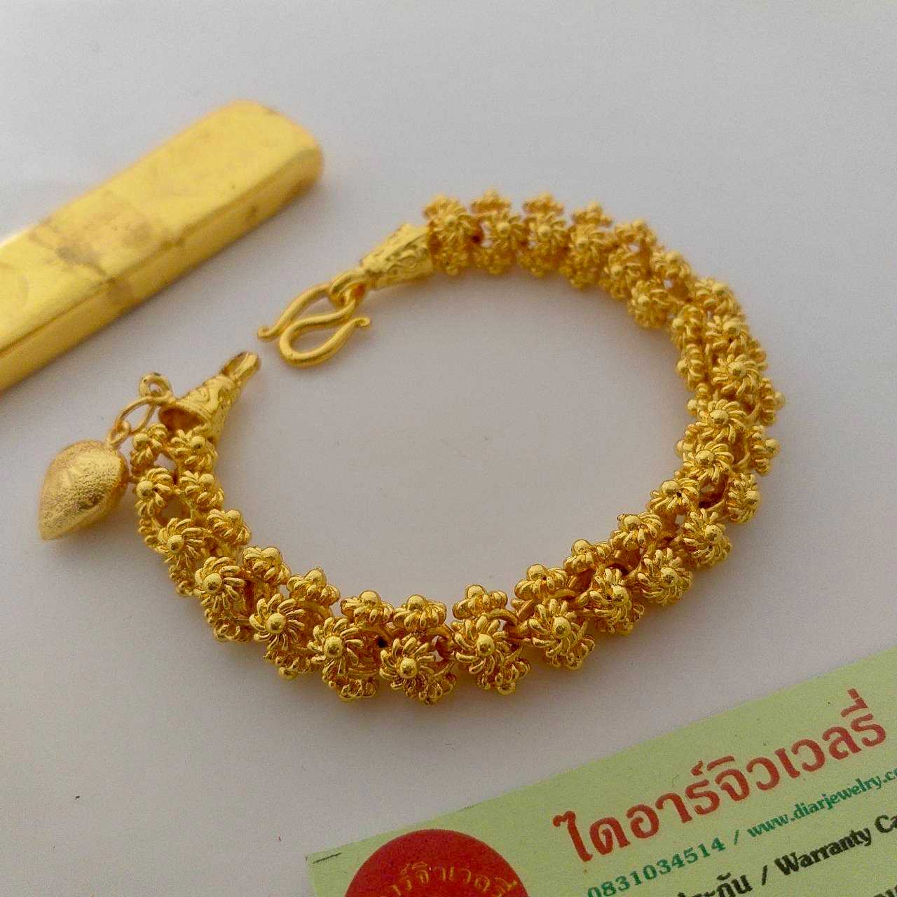 สร้อยข้อมือทองโคลนนิ่ง 2 บาท ลายดอกพิกุลใจพร้อมจี้หัวใจ