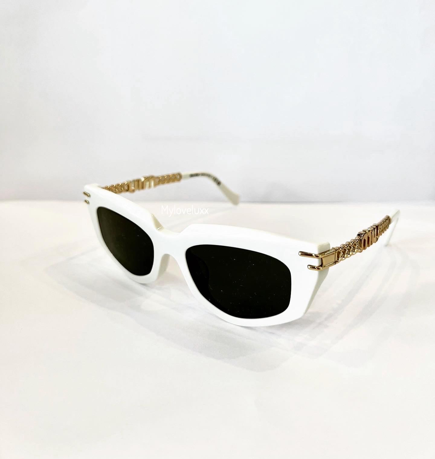 New Miu. Miu Logo sunglasses