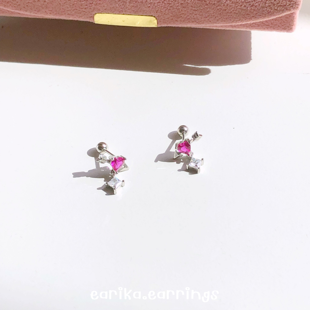 earika.earrings - magenta cupid soul piercing จิวหูเงินแท้หัวใจธนูประดับเพชรสีชมพูบานเย็น