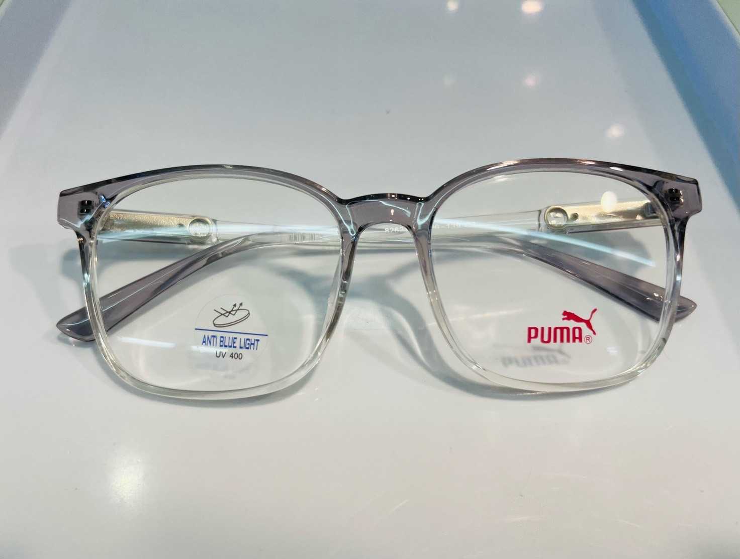 กรอบแว่นแบรนด์ Puma สีเทาตัดสีขาว