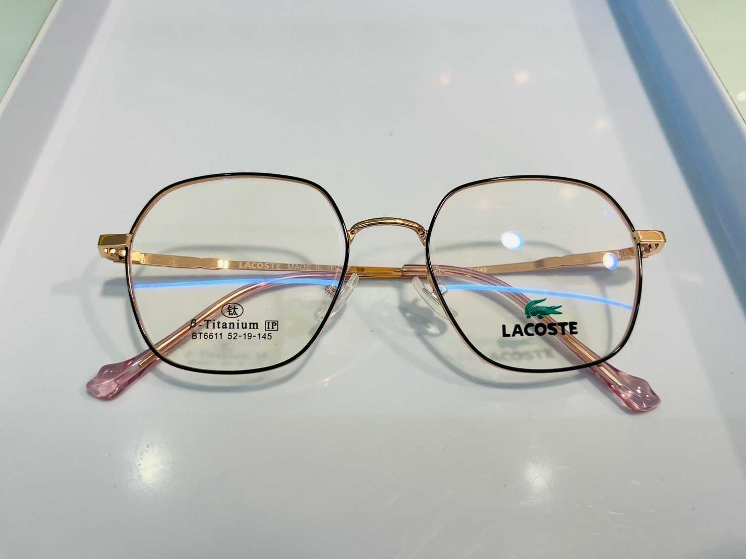 กรอบแว่นแบรนด์ Lacoste สี Rose Gold