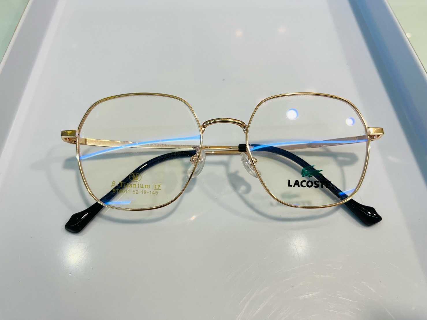 กรอบแว่นแบรนด์ Lacoste สีทอง