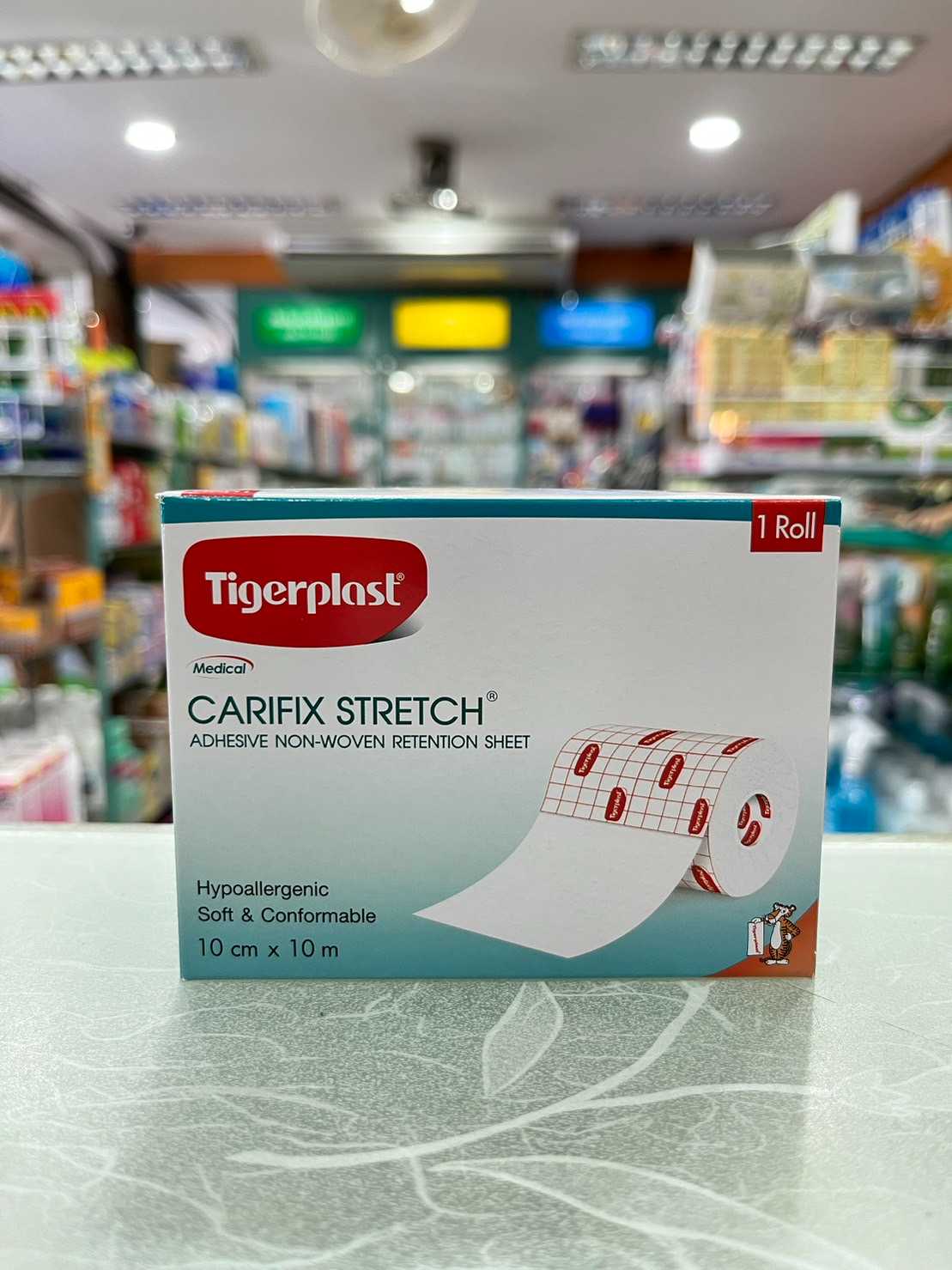 CARIFIX STRETCH 10CM.X10M.แผ่นติดแผลชนิดผ้าใยสังเคราะห์