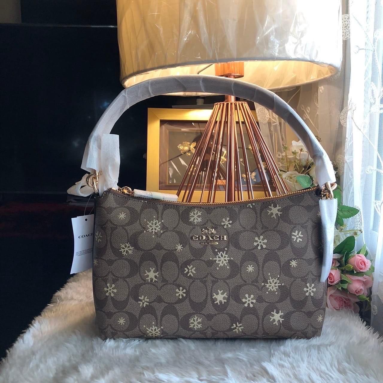 Coach snowflake purse hot sale