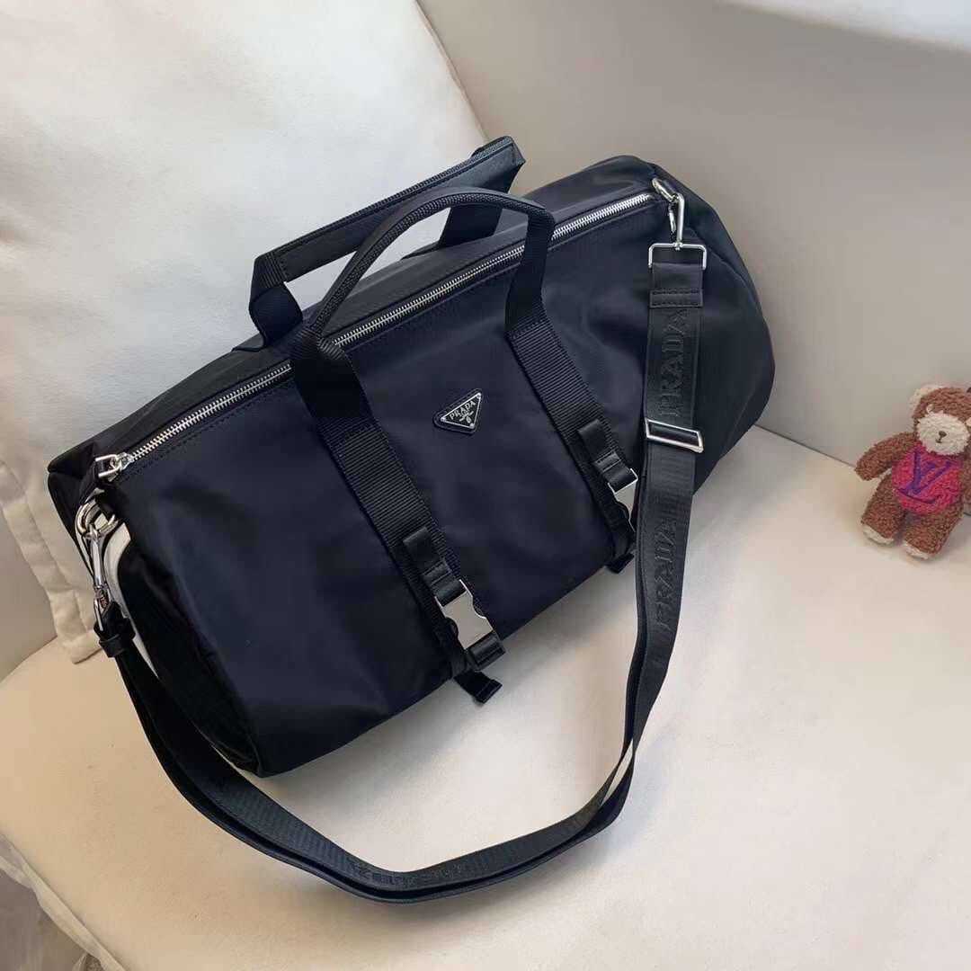 PRADA ADIDAS RE-NYLON DUFFLE BAG BLACK กระเป๋าเดินทางแบบถือ พร้อมสายยาวสะพายครอสบอดี้ ปราด้า อดิดาส