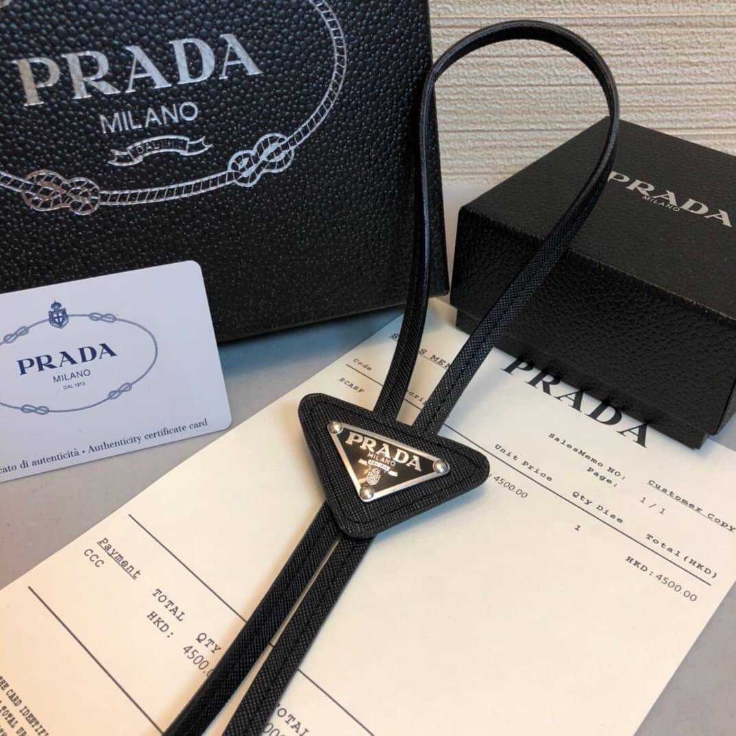 PRADA BLACK BRUSHED SAFFIANO LEATHER BOLO TIE เนคไทแบบสำเร็จรูป แบรนด์ปราด้า