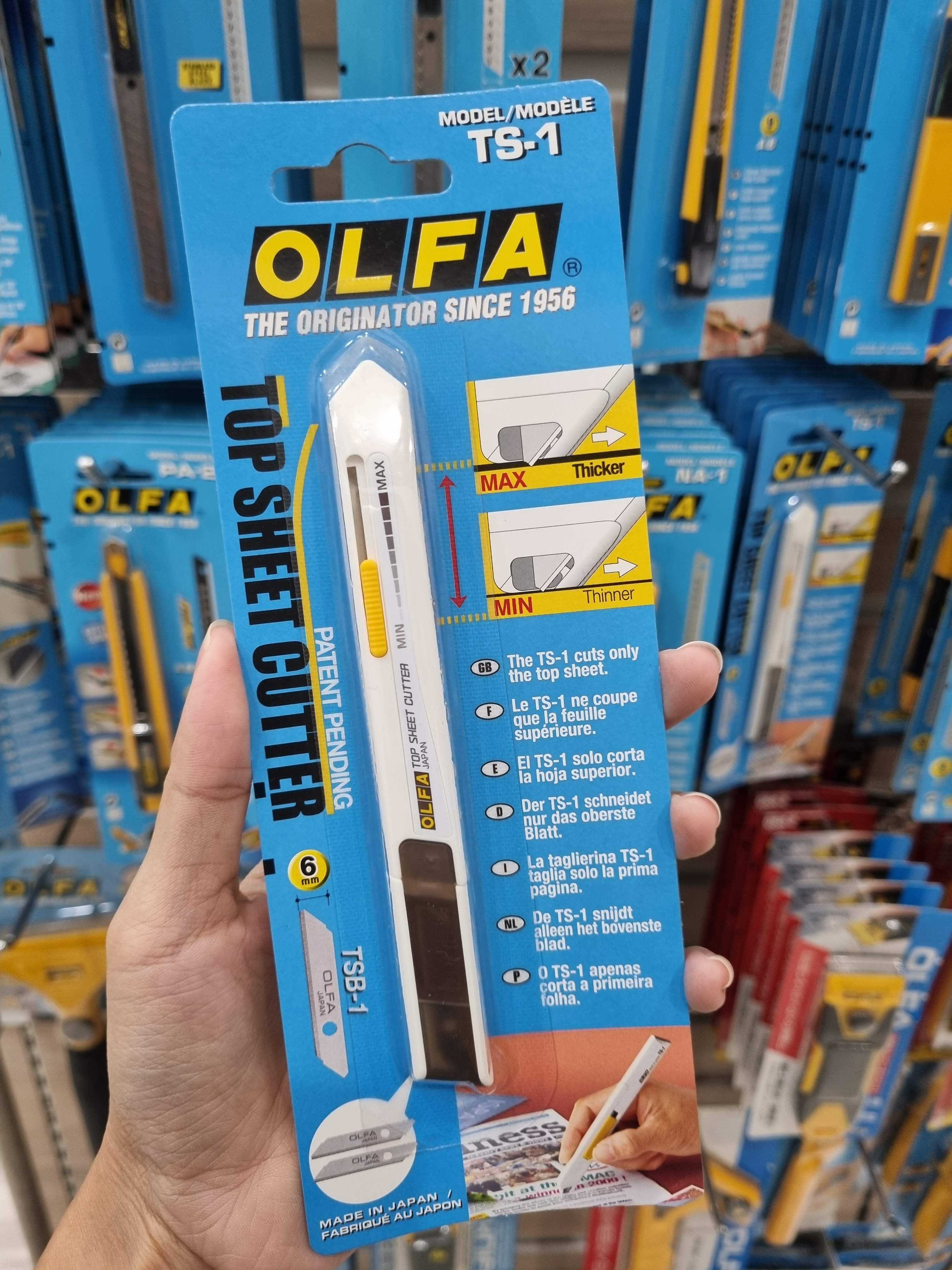 OLFA มีดคัตเตอร์ TS-1 ขนาด 6 มม.เก็บใบมีด 2 ใบในตัวด้าม มีปุ่มปรับสเกลความหนาบาง สำหรับกรีดนิตยสาร