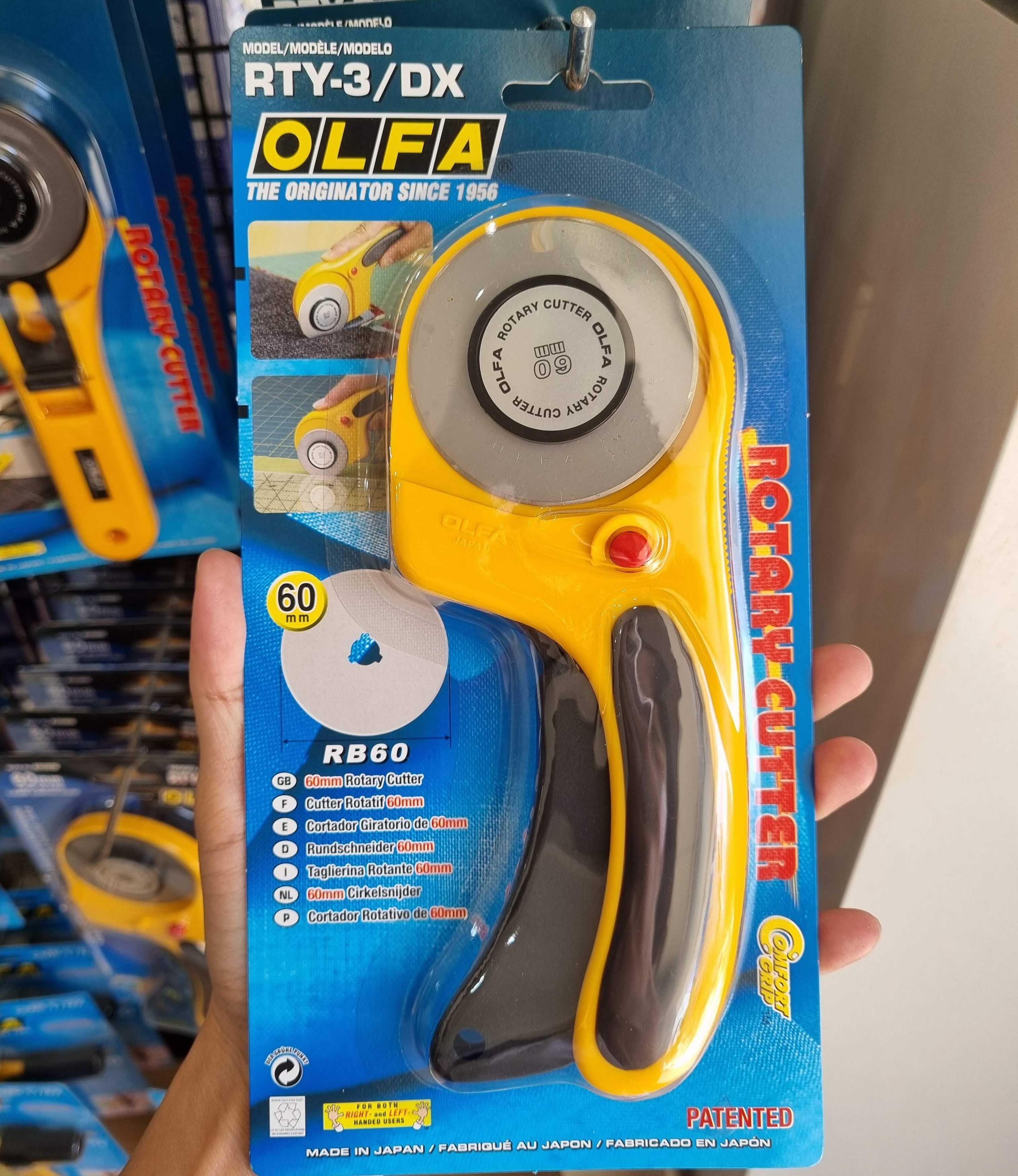 OLFA มีดคัตเตอร์โรตารี่ RTY-3/DX ขนาด 60 มม.ระบบ Safety lock งานตัดผ้า หนัง ตัดวัสดุบางได้ถึง 8 ชั้น