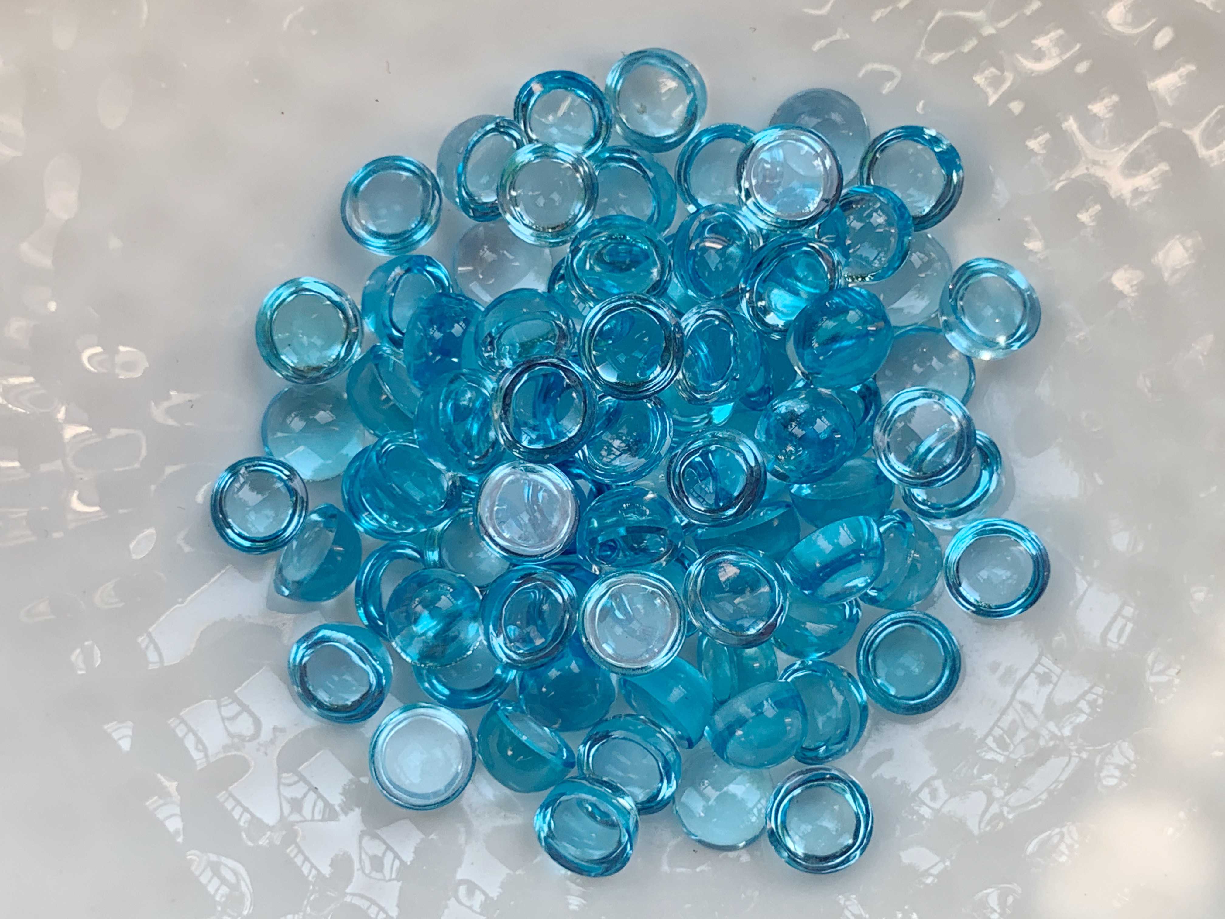 5.0mm. บลูโทปาสกลมหลังเบี้ย เม็ดละ 100฿