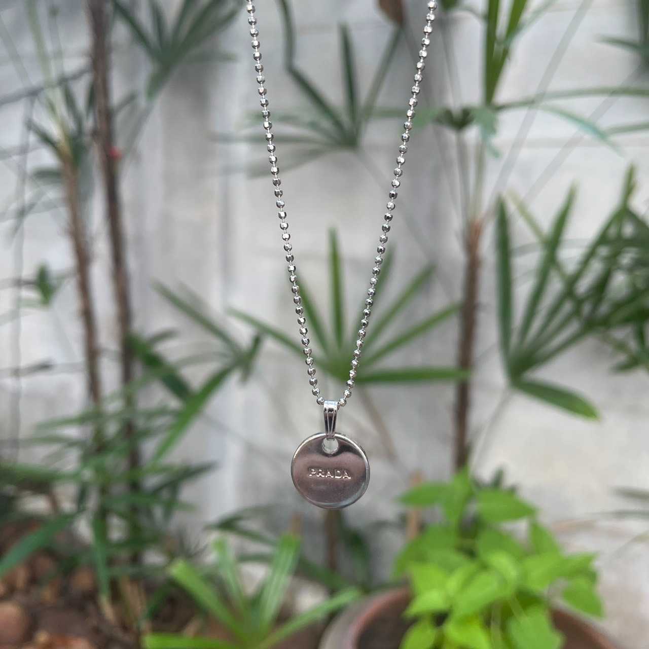 Prada circle necklace repurposed