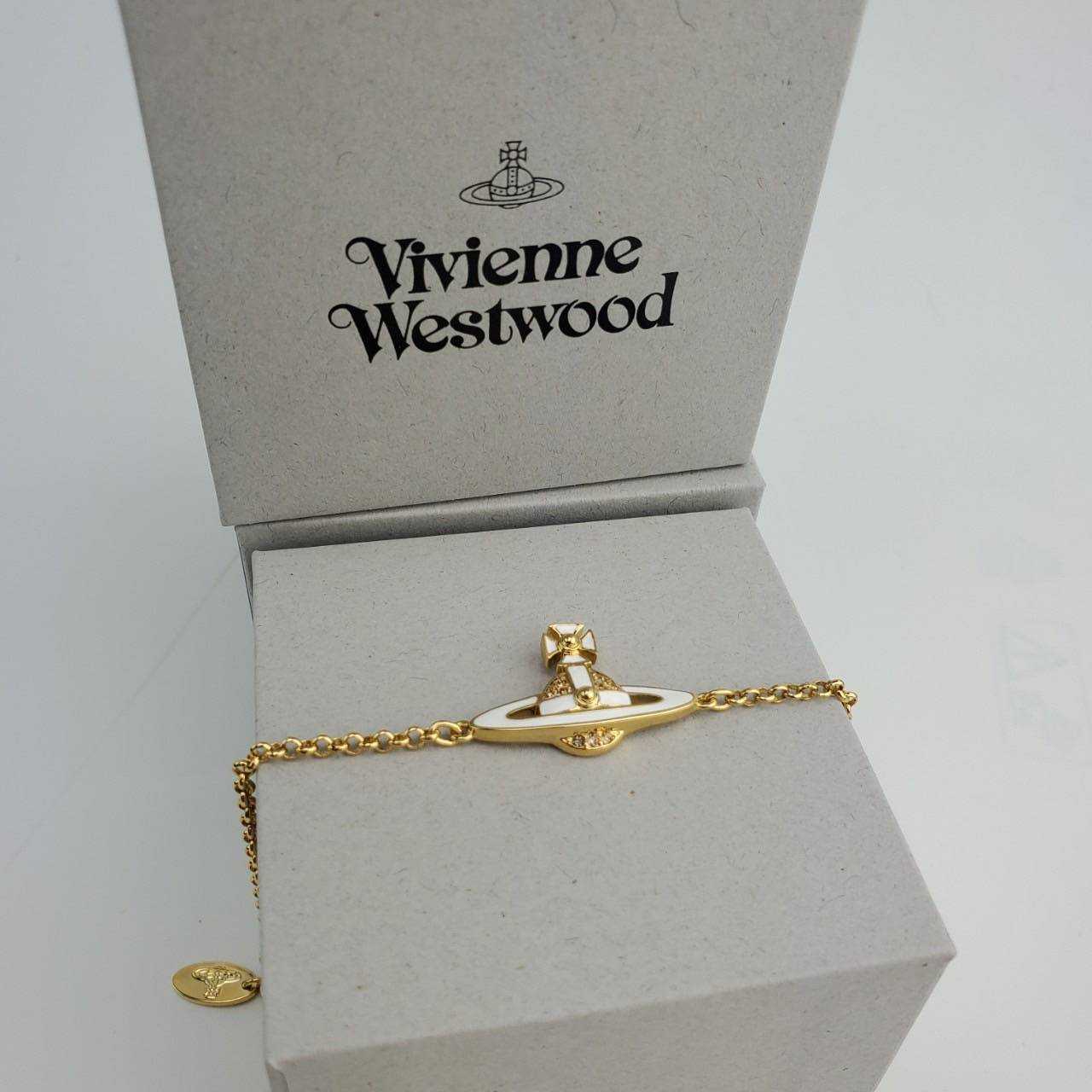 สร้อยข้อมือ Vivienne Westwood รุ่น Neil Mini Bas Bracelet สี Gold Light Colored Topaz White