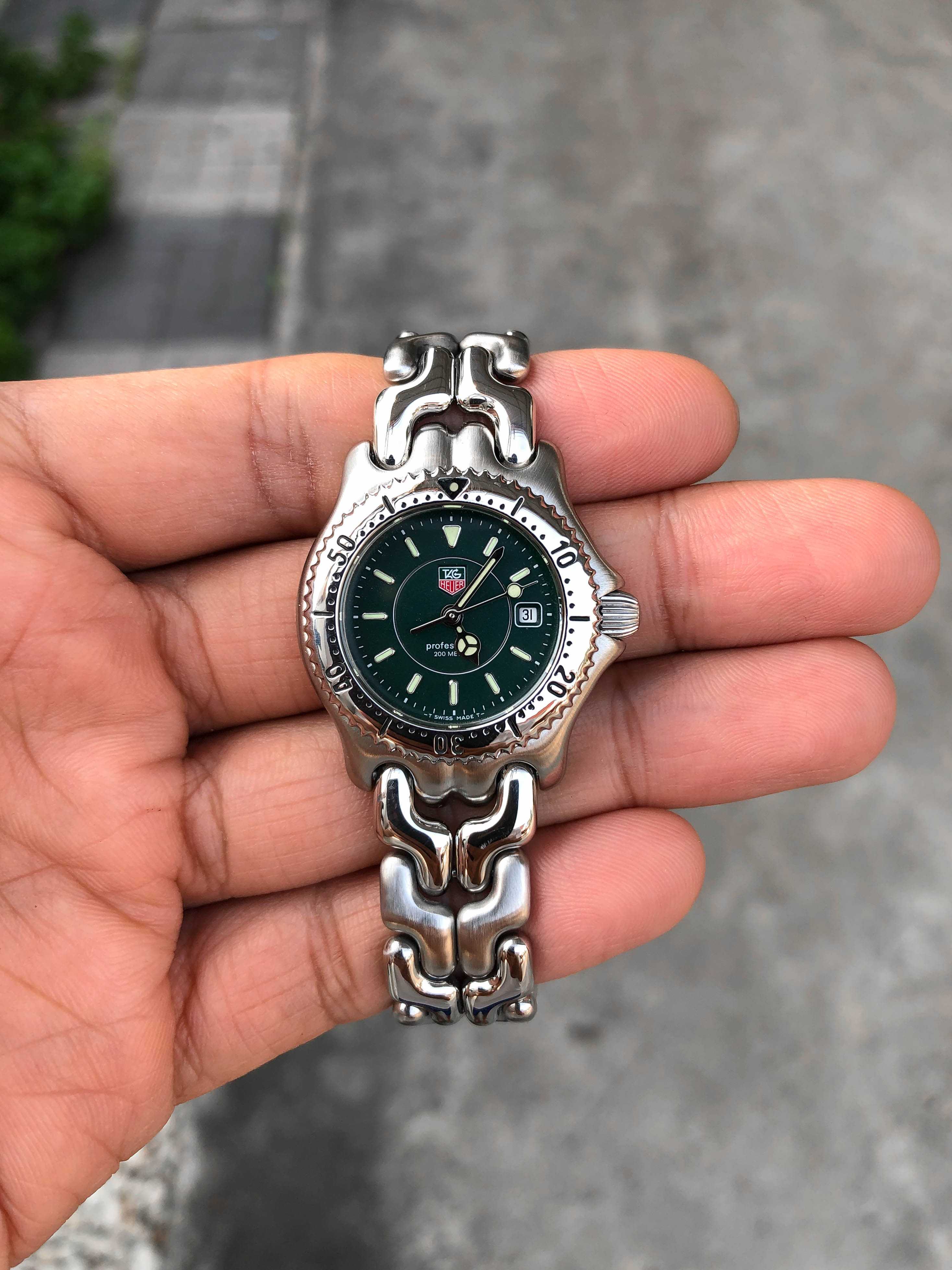 Tag Heuer ก้างปลา Lady Size Quartz เรือนเหล็ก สายเงาสลับด้าน หน้าเขียววงแหวน 3ชั้น