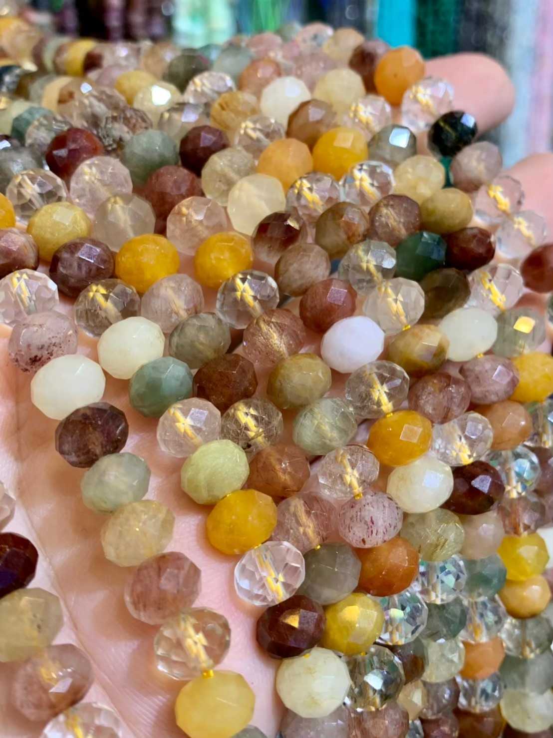 ไหมรวมสี ทรงล้อรถ (Mixed Rutilated Quartz) ผิวเจียเหลี่ยมเหลี่ยม เกรด Aเส้นยาว