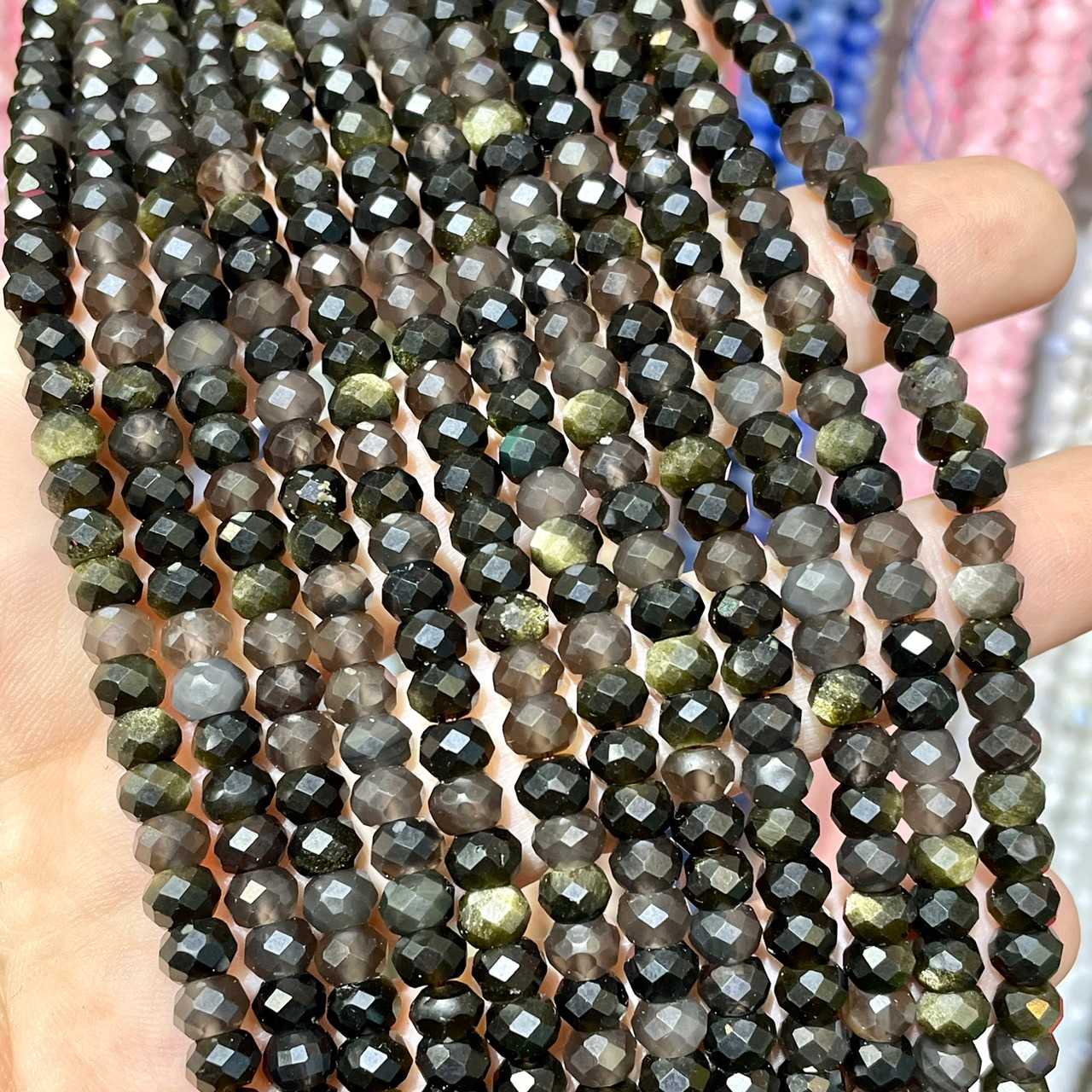 ออบซิเดียน สีทอง (Gold Obsidian) ทรงล้อรถ เจียเหลี่ยมเหลี่ยม 6x4 mm เส้นยาว