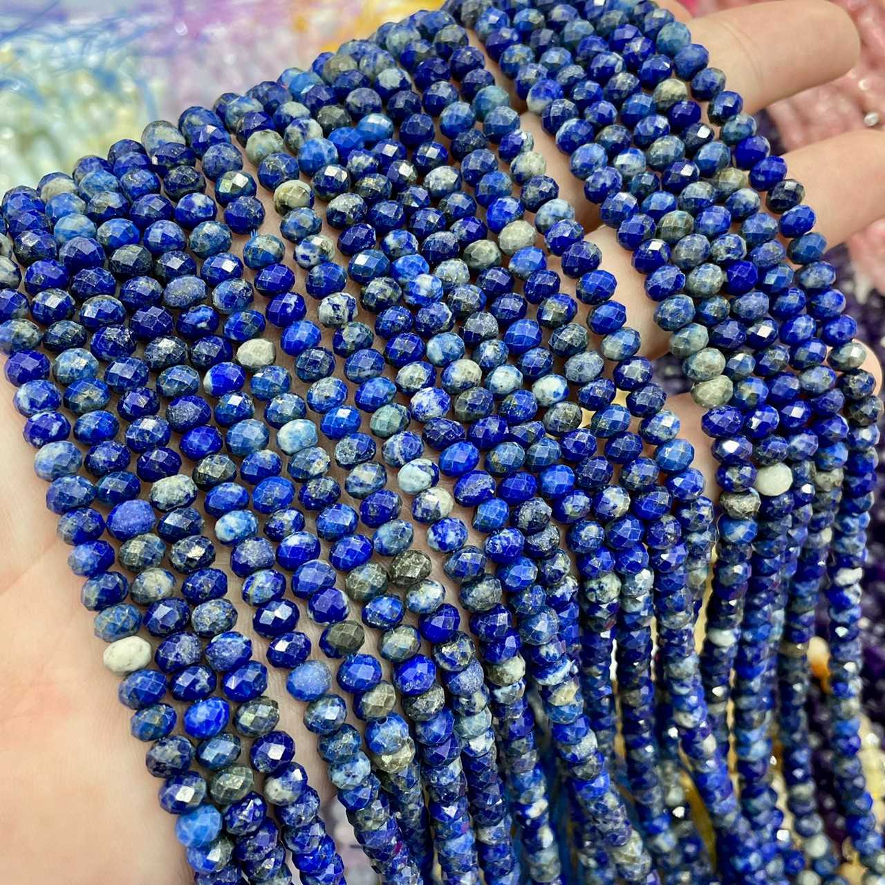ลาพิส ลาซูรี(Lapis lazuli) ทรงล้อรถ เจียเหลี่ยมเหลี่ยม 6x4 mm เส้นยาว